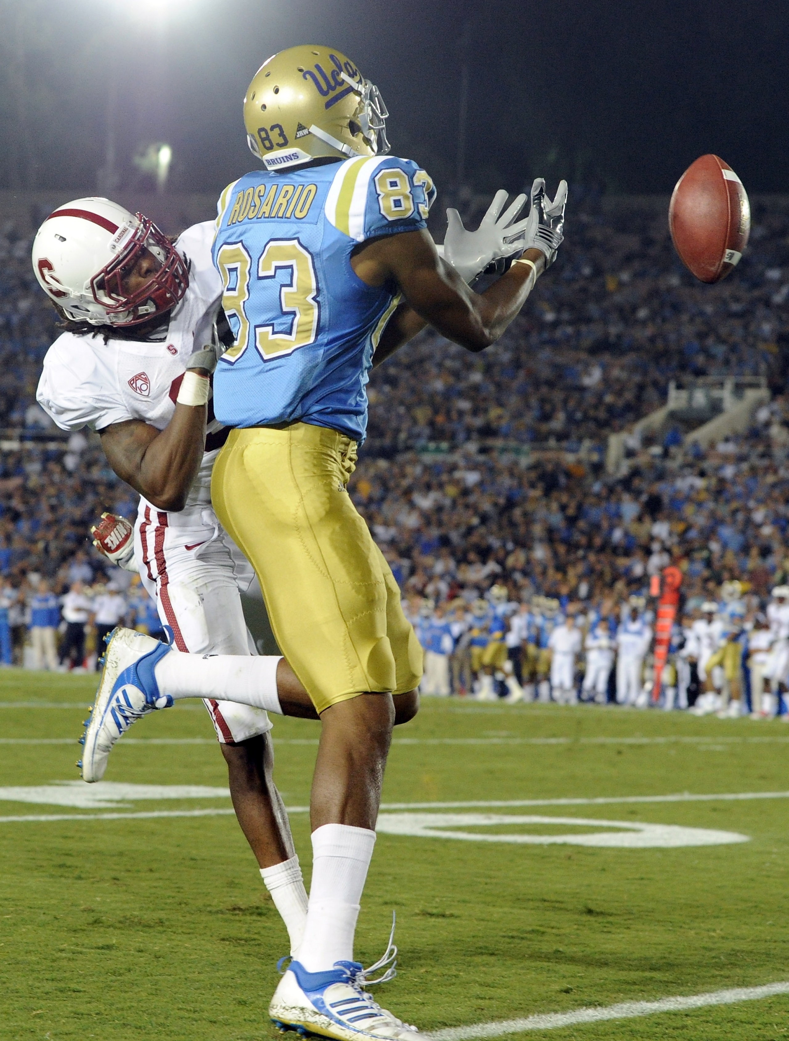 PASADENA, CA - SEPTEMBER 11:  Michael Thomas #3 of the Stanford knocks the ball away from Nelson Rosario #83 of UCLA during the third quarter at the Rose Bowl on September 11, 2010 in Pasadena, California.  (Photo by Harry How/Getty Images)