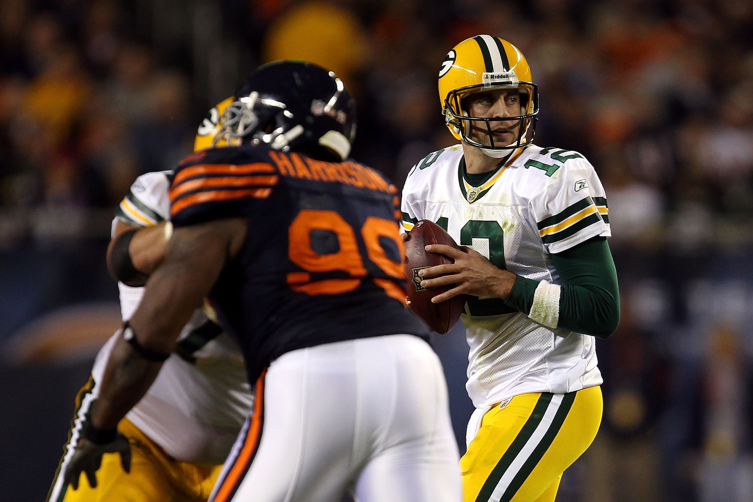 CHICAGO - SEPTEMBER 27: Aaron Rodgers #12 of the Green Bay Packers drops back to pass against the Chicago Bears at Soldier Field on September 27, 2010 in Chicago, Illinois. The Bears won 20-17. (Photo by Jonathan Daniel/Getty Images) CHICAGO - SEPTEMBER 27: Aaron Rodgers #12 of the Green Bay Packers drops back to pass against the Chicago Bears at Soldier Field on September 27, 2010 in Chicago, Illinois. The Bears won 20-17. (Photo by Jonathan Daniel/Getty Images)