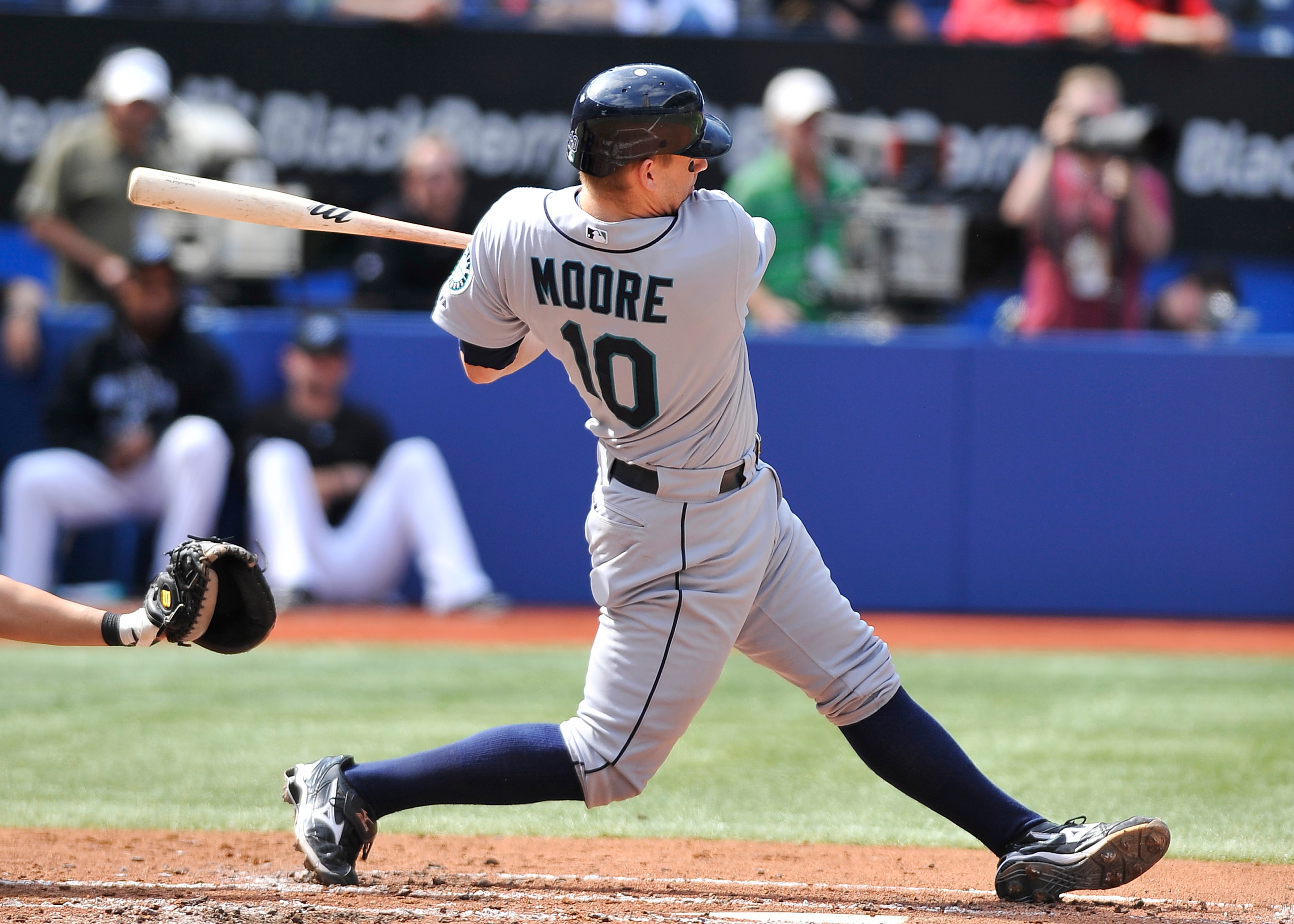TORONTO - SEPTEMBER 23: Adam Moore #10 of the Seattle Mariners bats against the Toronto Blue Jays during the game on September 23, 2010 at Rogers Centre in Toronto, Ontario, Canada. The Blue Jays defeated the Mariners 1-0. (Photo by Brad White/Getty Ima TORONTO - SEPTEMBER 23: Adam Moore #10 of the Seattle Mariners bats against the Toronto Blue Jays during the game on September 23, 2010 at Rogers Centre in Toronto, Ontario, Canada. The Blue Jays defeated the Mariners 1-0. (Photo by Brad White/Getty Ima
