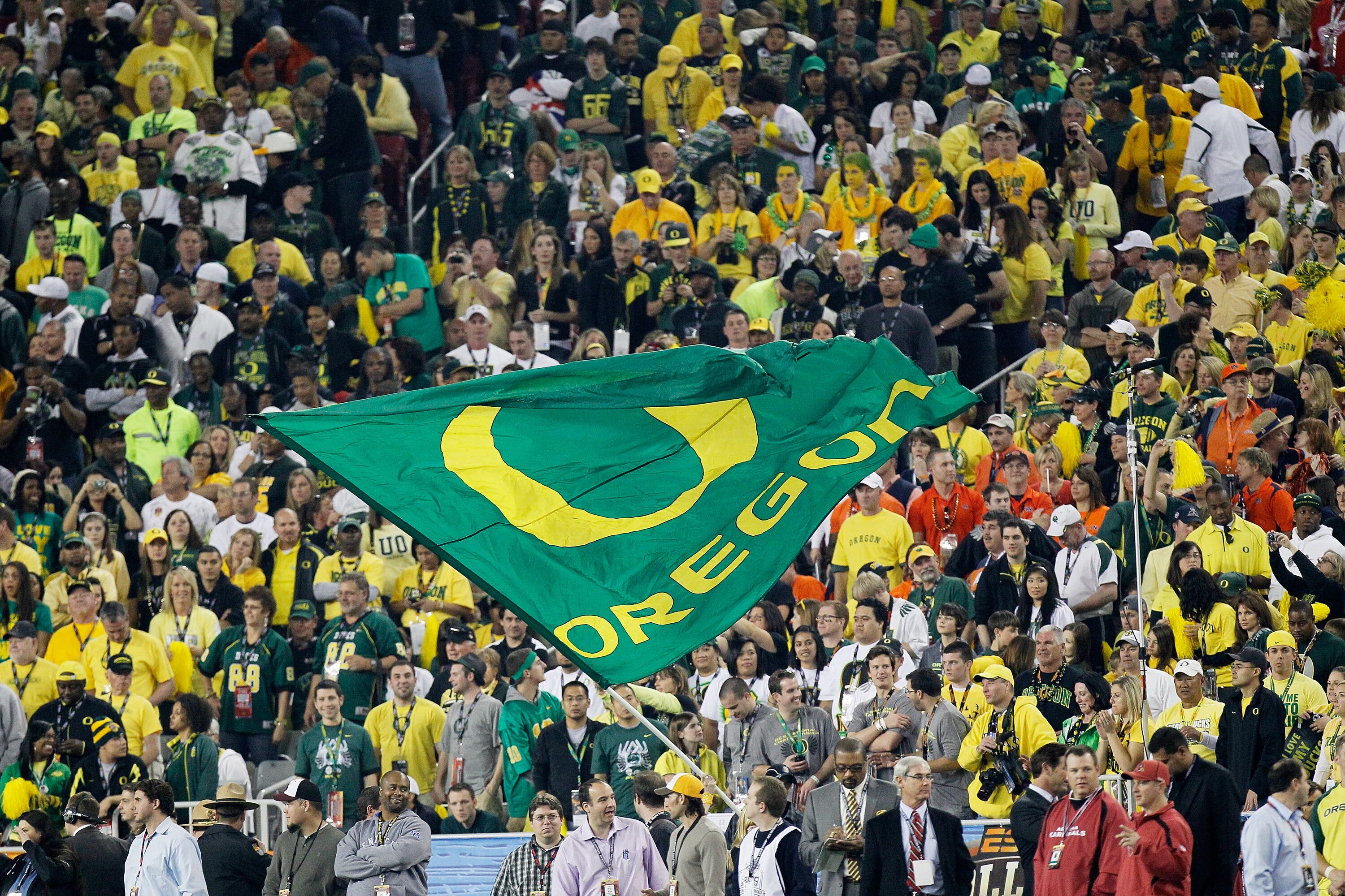 GLENDALE, AZ - JANUARY 10:  An Oregon Ducks flag is displayed at the Tostitos BCS National Championship Game against the Auburn Tigers at University of Phoenix Stadium on January 10, 2011 in Glendale, Arizona.  (Photo by Kevin C. Cox/Getty Images)