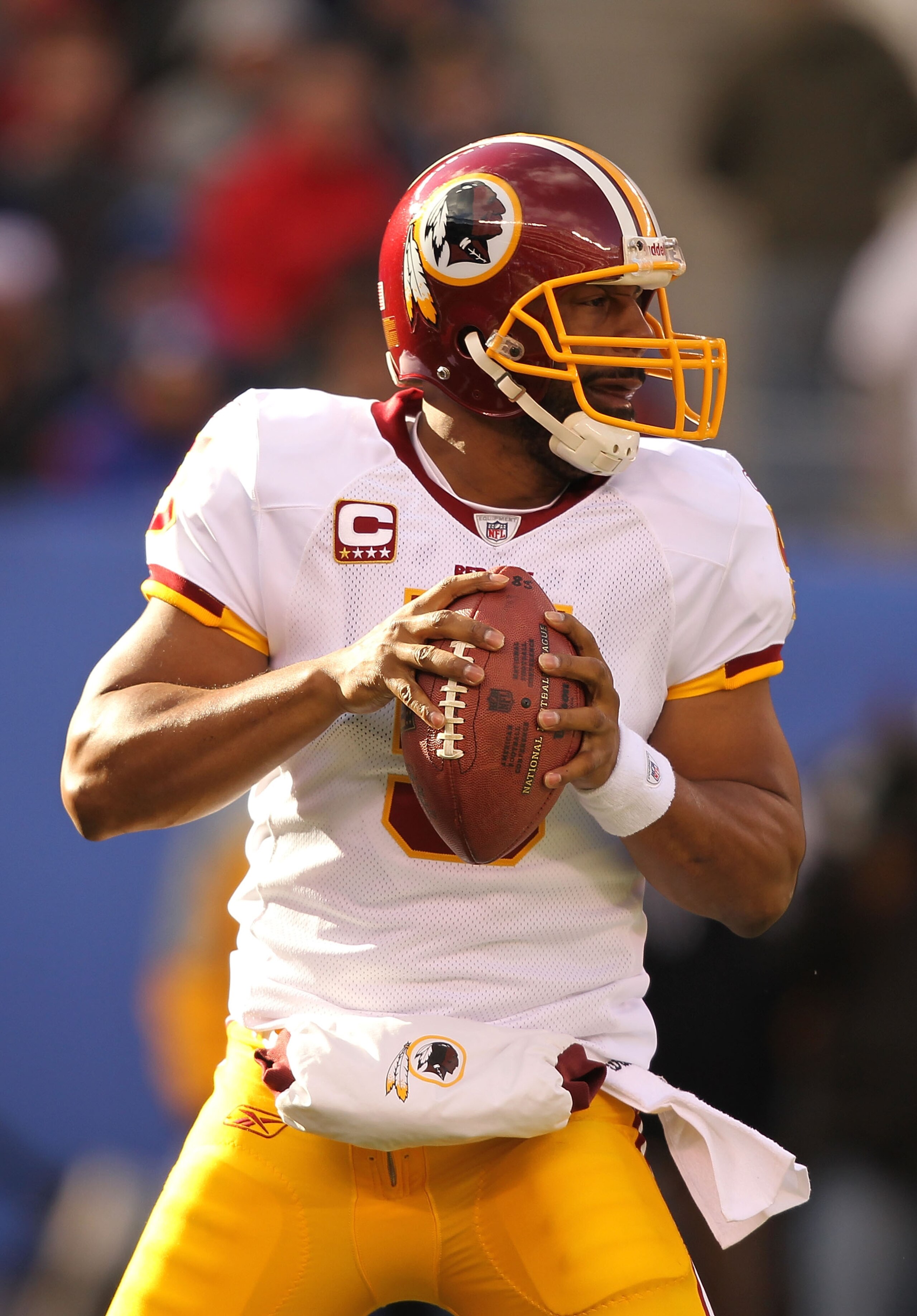 EAST RUTHERFORD, NJ - DECEMBER 05:  Donovan McNabb #5 of the Washington Redskins passes the  ball against the New York Giants during their game on December 5, 2010 at The New Meadowlands Stadium in East Rutherford, New Jersey.  (Photo by Al Bello/Getty Im