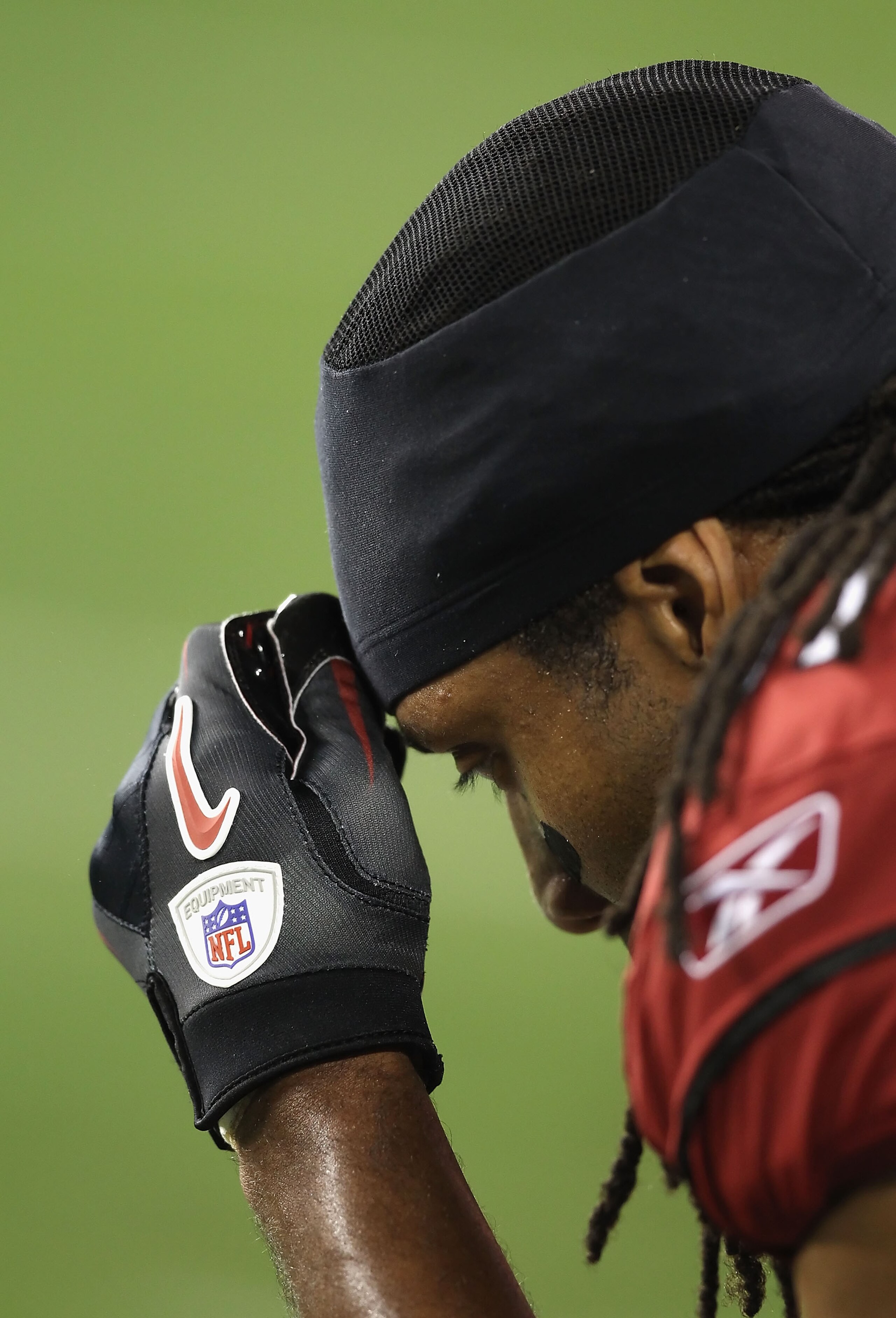 GLENDALE, AZ - DECEMBER 25:  Wide receiver Larry Fitzgerald #11 of the Arizona Cardinals during the NFL game against the Dallas Cowboys at the University of Phoenix Stadium on December 25, 2010 in Glendale, Arizona. The Cardinals defeated the Cowboys 27-2