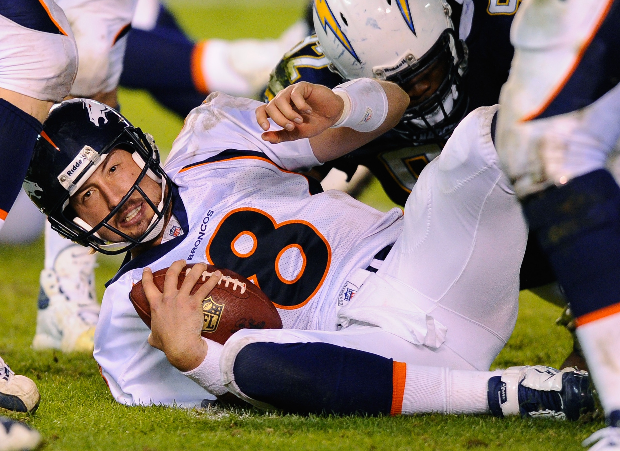 SAN DIEGO - NOVEMBER 22: Quarterback Kyle Orton #8 of the Denver Broncos is sacked by Larry English #52 of the San Diego Chargers at Qualcomm Stadium on November 22, 2010 in San Diego, California. Chargers defeated the Broncos 35-14. (Photo by Kevork Dj SAN DIEGO - NOVEMBER 22: Quarterback Kyle Orton #8 of the Denver Broncos is sacked by Larry English #52 of the San Diego Chargers at Qualcomm Stadium on November 22, 2010 in San Diego, California. Chargers defeated the Broncos 35-14. (Photo by Kevork Dj