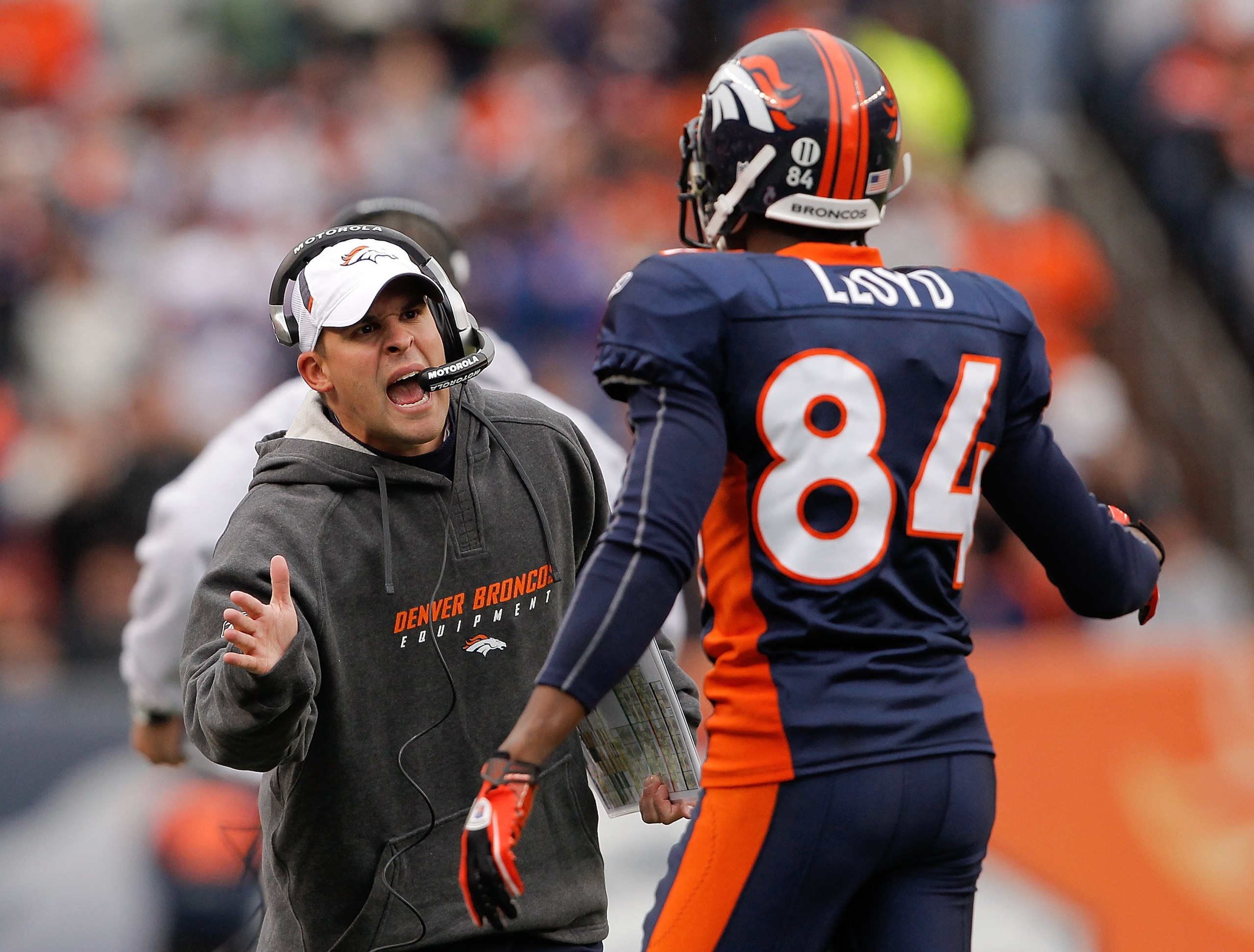 DENVER - NOVEMBER 28: Head coach Josh McDaniels of the Denver Broncos celebrates a touchdown by Knowshon Moreno with wide receiver Brandon Lloyd #84 against the St. Louis Rams at INVESCO Field at Mile High on November 28, 2010 in Denver, Colorado. The Ra DENVER - NOVEMBER 28: Head coach Josh McDaniels of the Denver Broncos celebrates a touchdown by Knowshon Moreno with wide receiver Brandon Lloyd #84 against the St. Louis Rams at INVESCO Field at Mile High on November 28, 2010 in Denver, Colorado. The Ra