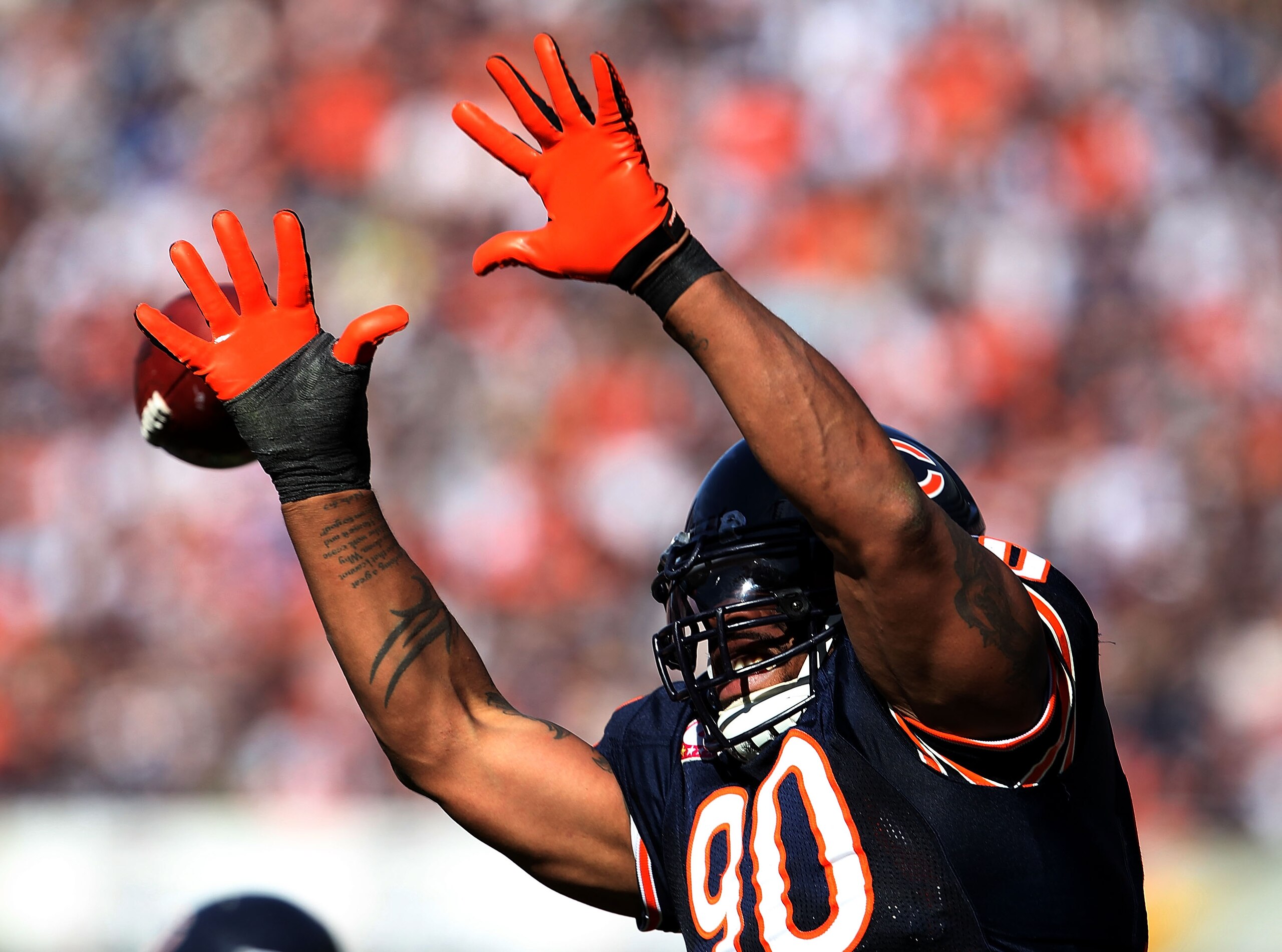 CHICAGO - OCTOBER 17: Julius Peppers #90 of the Chicago Bears leaps to get his hand on the ball against the Seattle Seahawks at Soldier Field on October 17, 2010 in Chicago, Illinois. The Seahawks defeated the Bears 23-20. (Photo by Jonathan Daniel/Getty