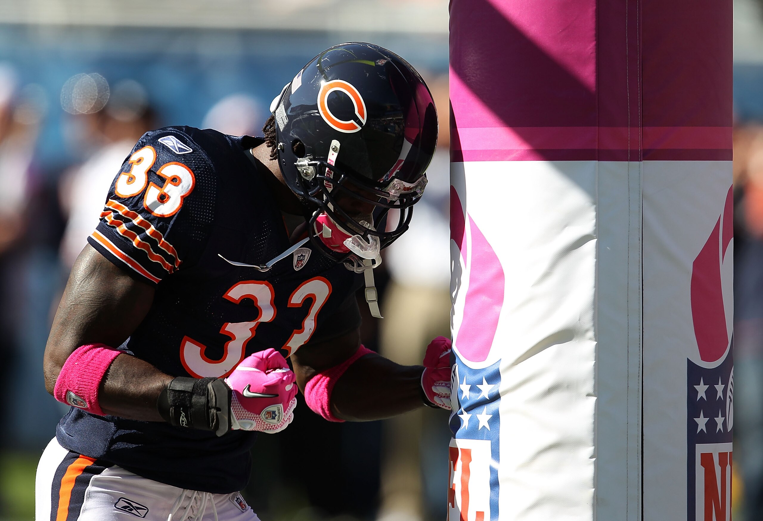 CHICAGO - OCTOBER 17: Charles Tillman #33 of the Chicago Bears uses the goal post as a punching bag during warm-ups before a game against the Seattle Seahawks at Soldier Field on October 17, 2010 in Chicago, Illinois. (Photo by Jonathan Daniel/Getty Image CHICAGO - OCTOBER 17: Charles Tillman #33 of the Chicago Bears uses the goal post as a punching bag during warm-ups before a game against the Seattle Seahawks at Soldier Field on October 17, 2010 in Chicago, Illinois. (Photo by Jonathan Daniel/Getty Image