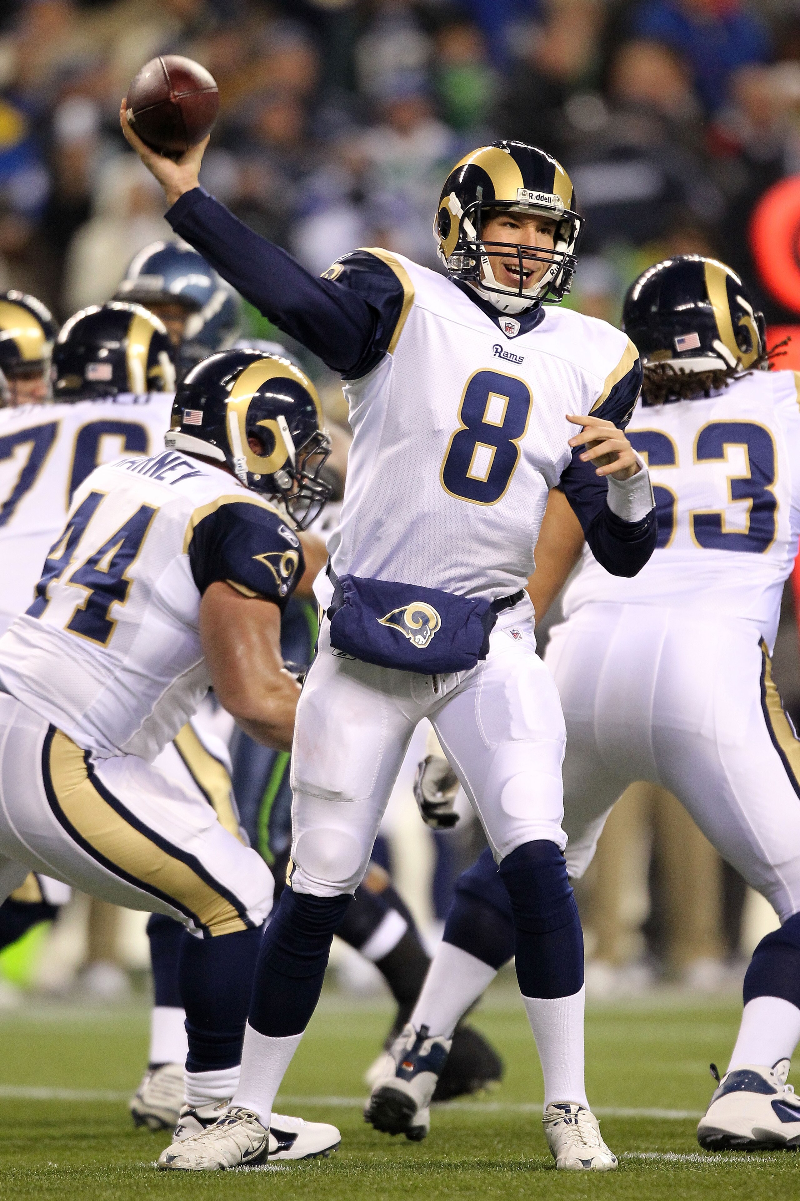 SEATTLE, WA - JANUARY 02:  Quarterback Sam Bradford #8 of the St. Louis Rams looks to pass against the Seattle Seahawks during their game at Qwest Field on January 2, 2011 in Seattle, Washington.  (Photo by Otto Greule Jr/Getty Images)