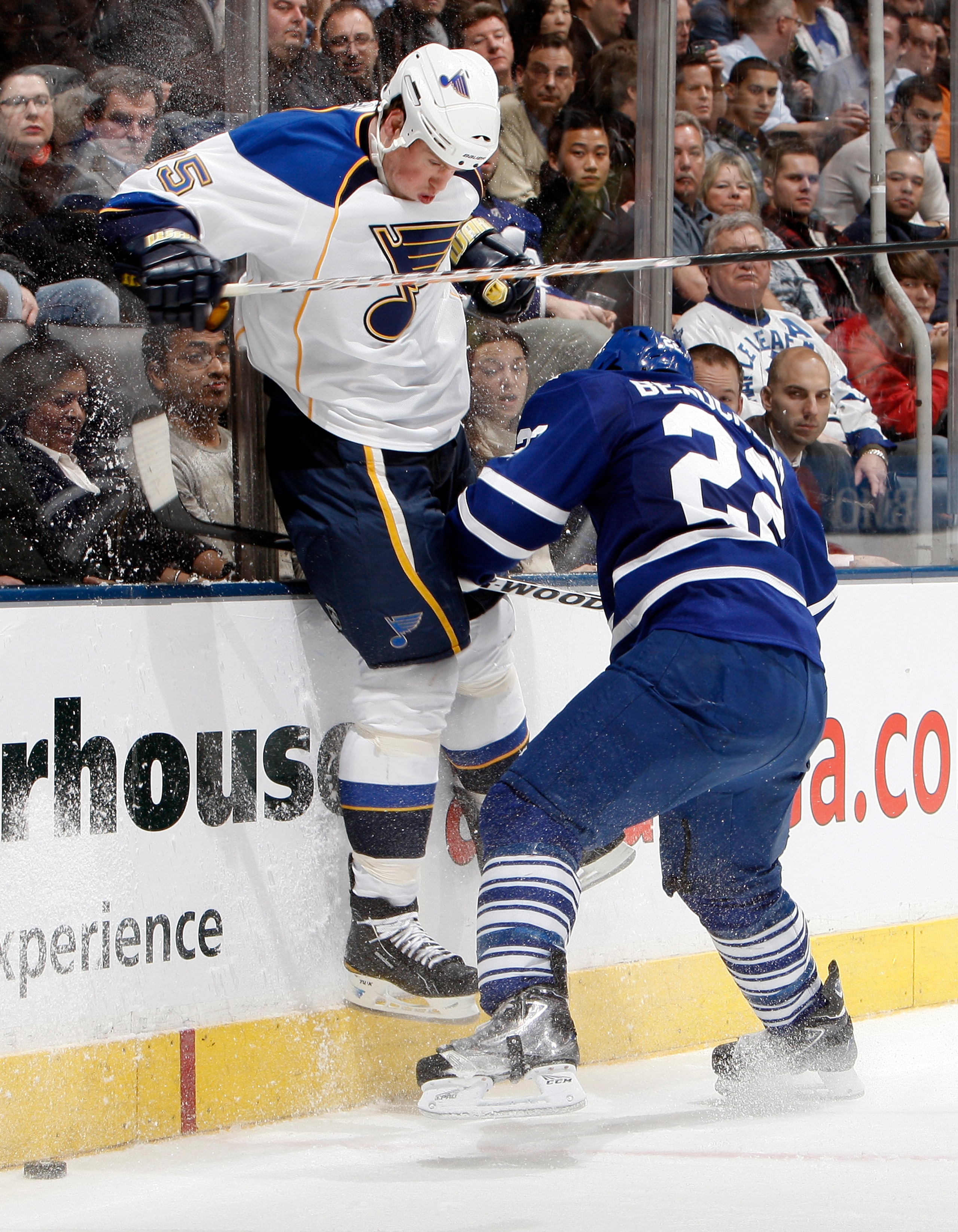 TORONTO, CANADA - JANUARY 6: Francois Beauchemin #22 of the Toronto Maple Leafs runs into Brad Winchester #15 of the St. Louis Blues during game action at the Air Canada Centre January 6, 2011 in Toronto, Ontario, Canada. (Photo by Abelimages/Getty Images TORONTO, CANADA - JANUARY 6: Francois Beauchemin #22 of the Toronto Maple Leafs runs into Brad Winchester #15 of the St. Louis Blues during game action at the Air Canada Centre January 6, 2011 in Toronto, Ontario, Canada. (Photo by Abelimages/Getty Images