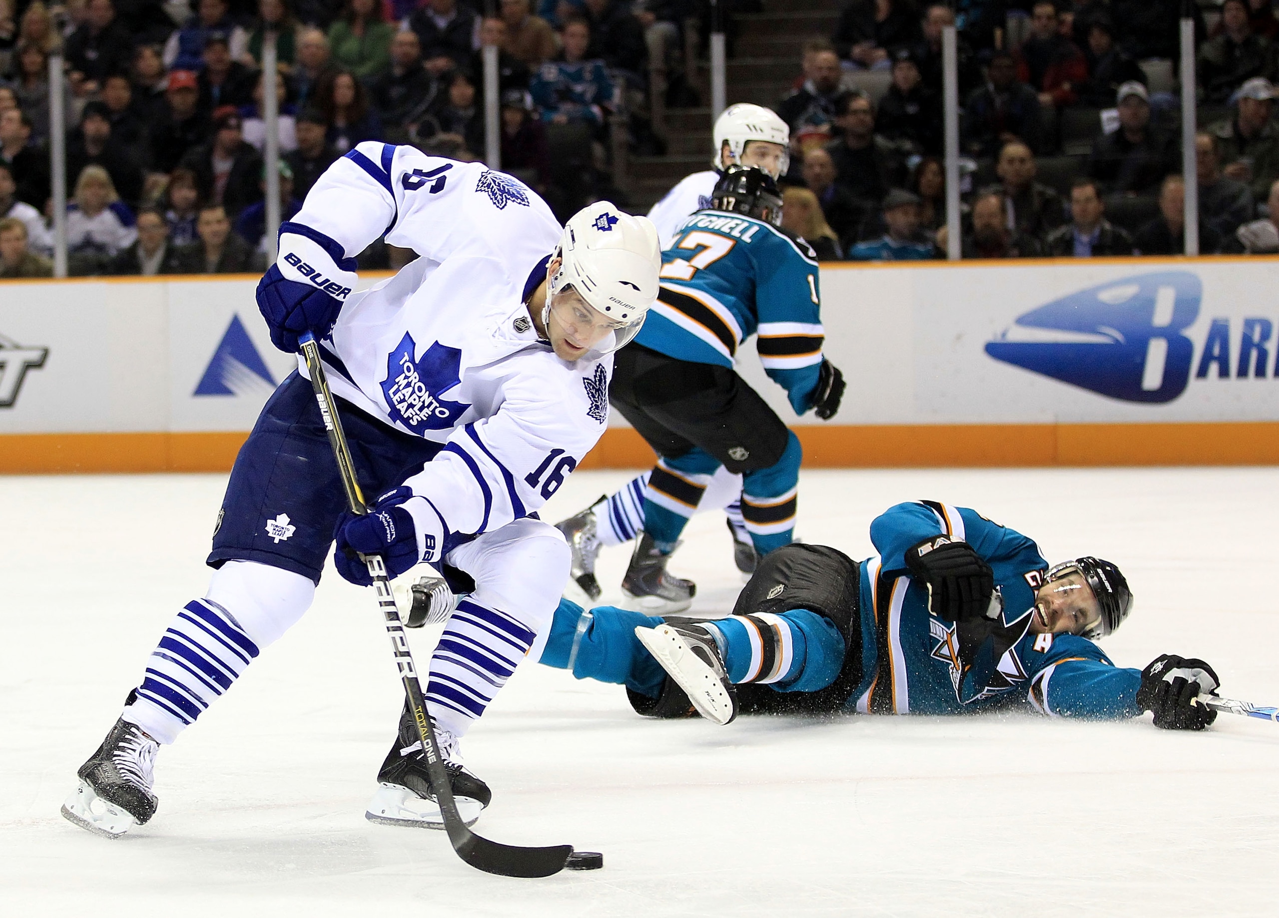 SAN JOSE, CA - JANUARY 11: Clarke MacArthur #16 of the Toronto Maple Leafs skates past a diving Dan Boyle #22 of the San Jose Sharks at HP Pavilion on January 11, 2011 in San Jose, California. (Photo by Ezra Shaw/Getty Images) SAN JOSE, CA - JANUARY 11: Clarke MacArthur #16 of the Toronto Maple Leafs skates past a diving Dan Boyle #22 of the San Jose Sharks at HP Pavilion on January 11, 2011 in San Jose, California. (Photo by Ezra Shaw/Getty Images)
