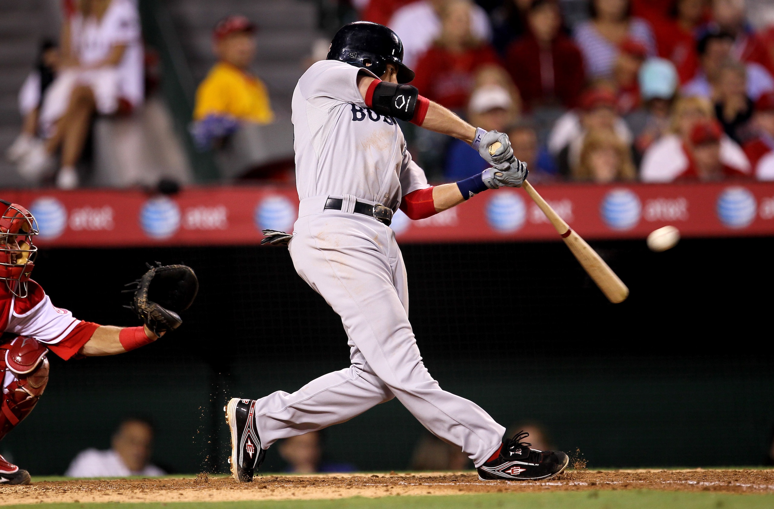 ANAHEIM, CA - JULY 27:  Jed Lowrie #12 of the Boston Red Sox hits a two RBI double in the seventh inning against the Los Angeles Angels of Anaheim on July 27, 2010 at Angel Stadium in Anaheim, California.  (Photo by Stephen Dunn/Getty Images)