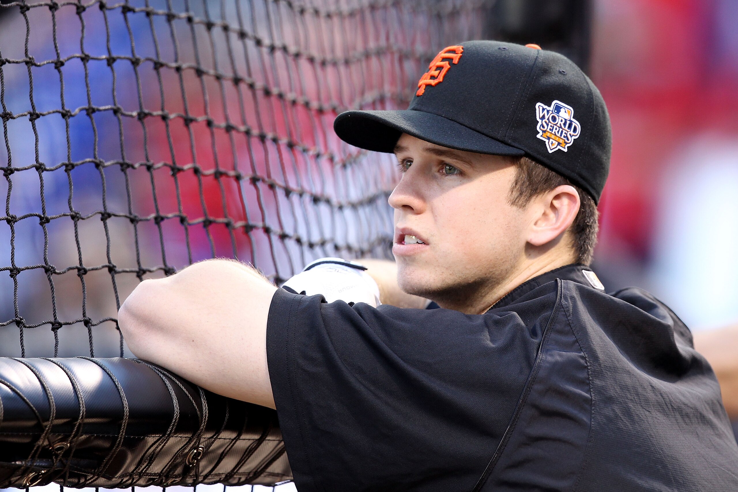 ARLINGTON, TX - OCTOBER 31:  Buster Posey #28 of the San Francisco Giants looks on during batting practice against the Texas Rangers in Game Four of the 2010 MLB World Series at Rangers Ballpark in Arlington on October 31, 2010 in Arlington, Texas.  (Phot