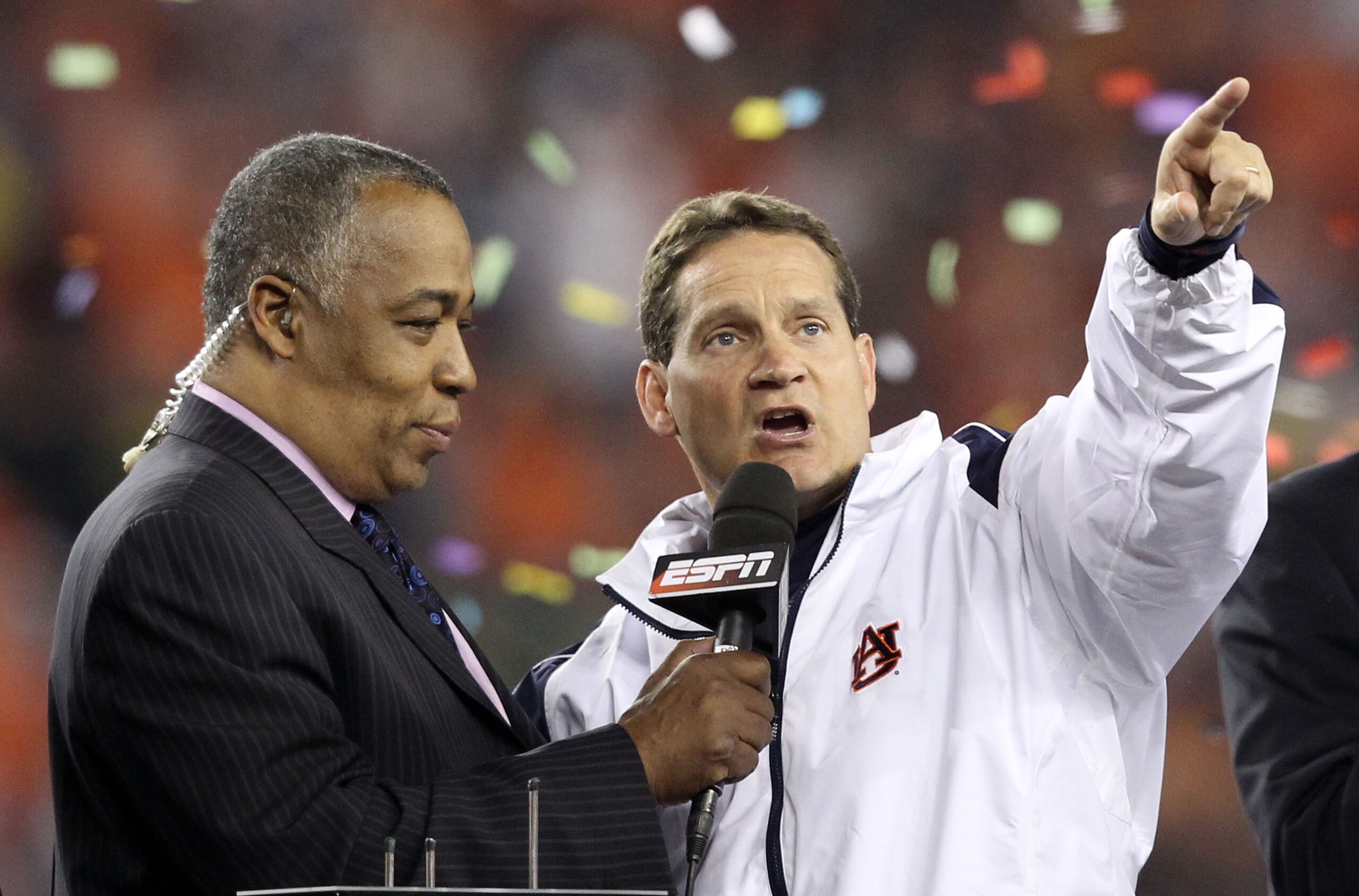 GLENDALE, AZ - JANUARY 10:  Head coach Gene Chizik of the Auburn Tigers celebrates the Tigers 22-19 victory against the Oregon Ducks during the Tostitos BCS National Championship Game at University of Phoenix Stadium on January 10, 2011 in Glendale, Arizo