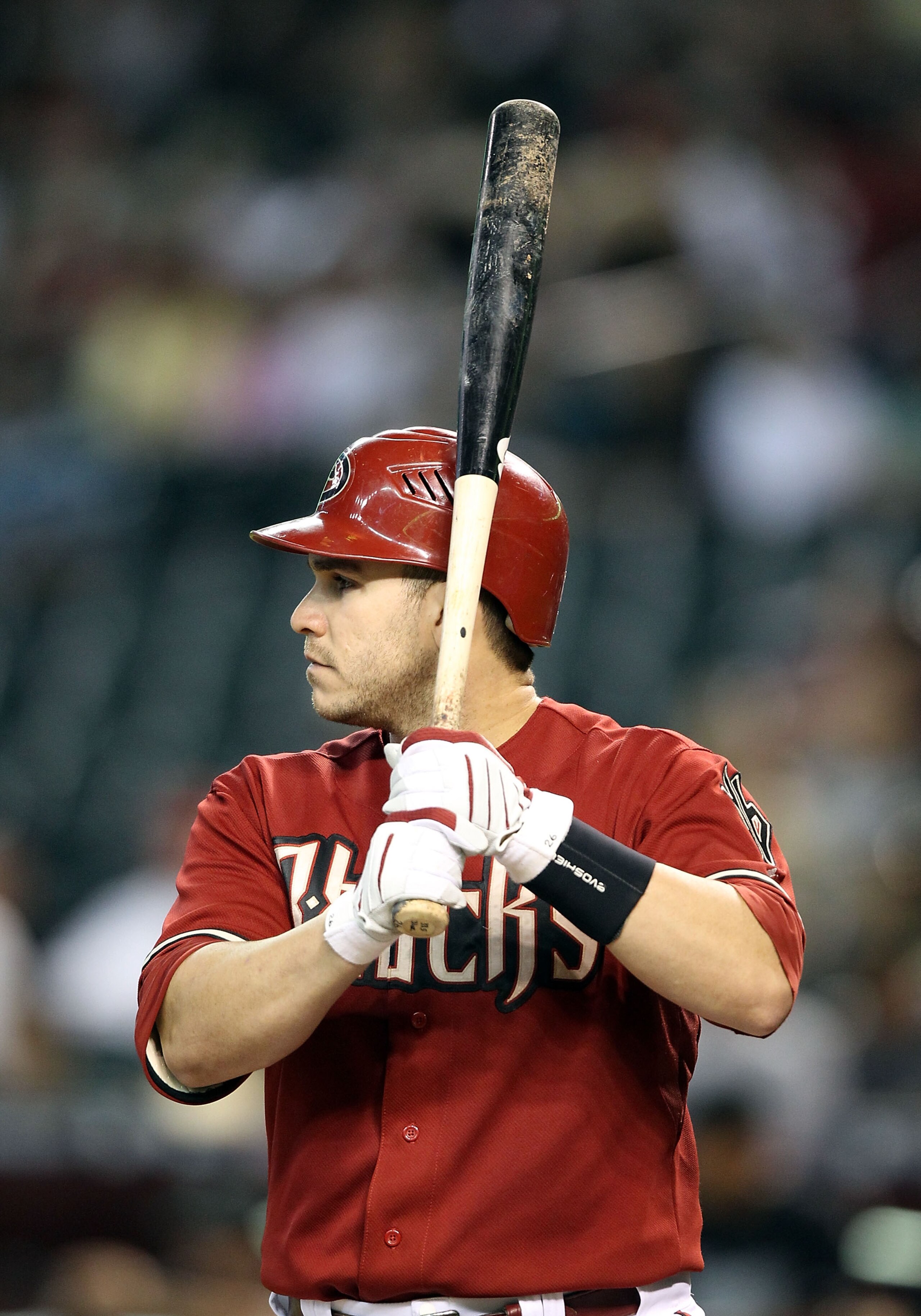 PHOENIX - JULY 11:  Miguel Montero #26 of the Arizona Diamondbacks bats against the Florida Marlins during the Major League Baseball game at Chase Field on July 11, 2010 in Phoenix, Arizona.  The Marlins defeated the Diamondbacks 2-0.  (Photo by Christian