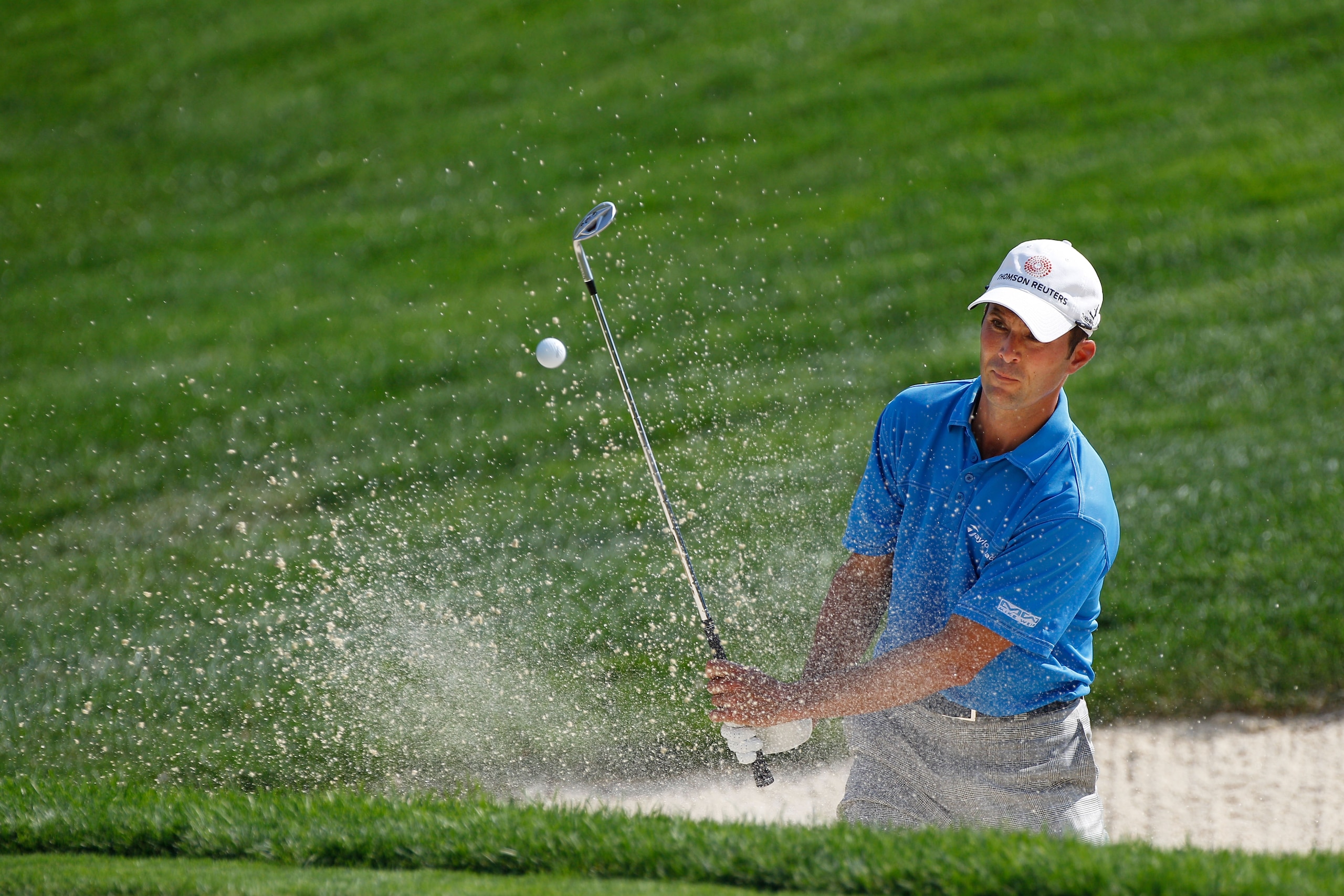 AKRON, OH - AUGUST 05: Mike Weir of Canada hits from a bunker on the seventh hole during the first round of the World Golf Championships - Bridgestone Invitational on the South Course at Firestone Country Club on August 5, 2010 in Akron, Ohio. (Photo by AKRON, OH - AUGUST 05: Mike Weir of Canada hits from a bunker on the seventh hole during the first round of the World Golf Championships - Bridgestone Invitational on the South Course at Firestone Country Club on August 5, 2010 in Akron, Ohio. (Photo by