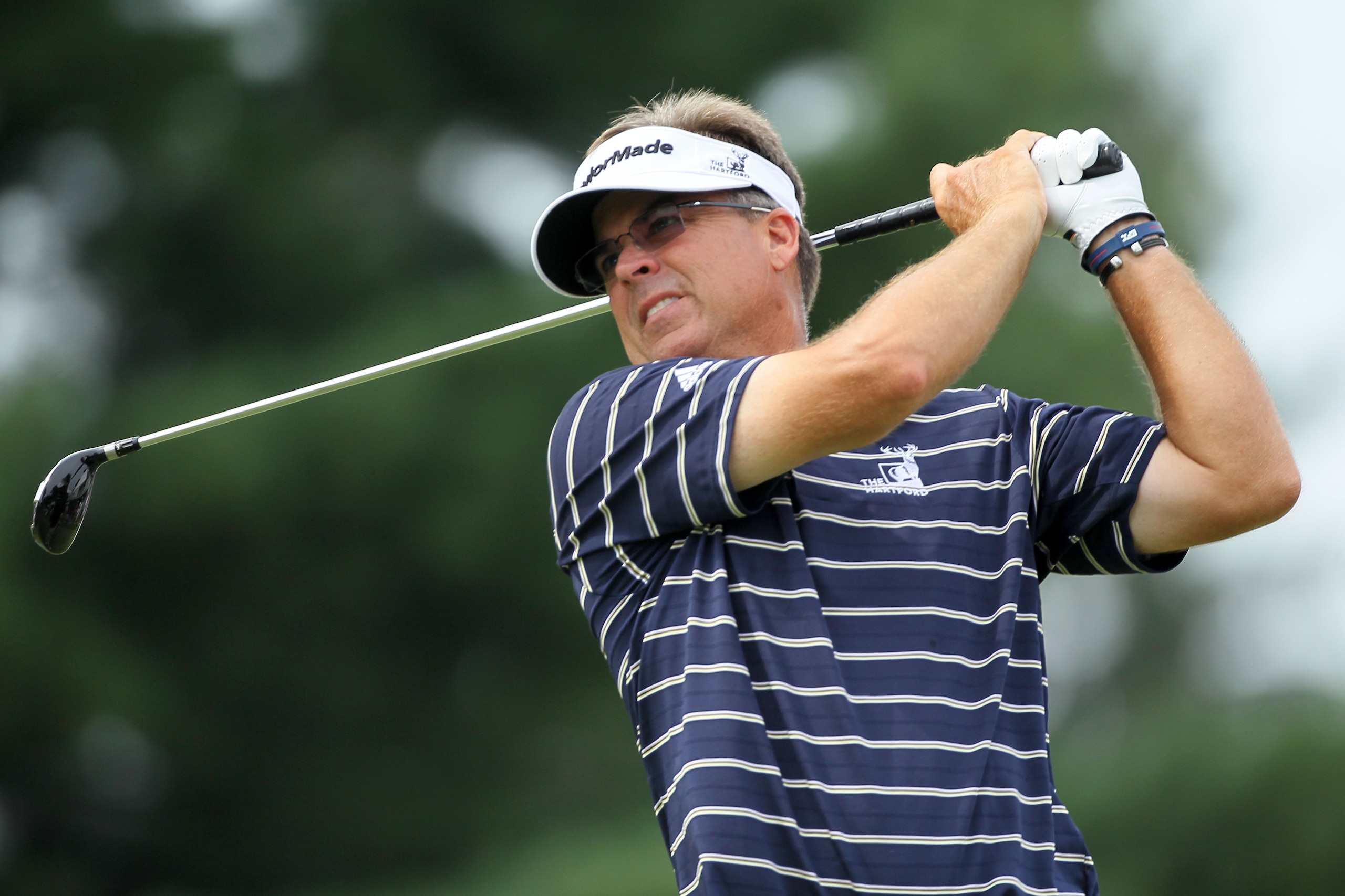 AKRON, OH - AUGUST 08: Kenny Perry plays his tee shot on the 17th hole during the final round of the World Golf Championships - Bridgestone Invitational on the South Course at Firestone Country Club on August 8, 2010 in Akron, Ohio. (Photo by Andy Lyons AKRON, OH - AUGUST 08: Kenny Perry plays his tee shot on the 17th hole during the final round of the World Golf Championships - Bridgestone Invitational on the South Course at Firestone Country Club on August 8, 2010 in Akron, Ohio. (Photo by Andy Lyons