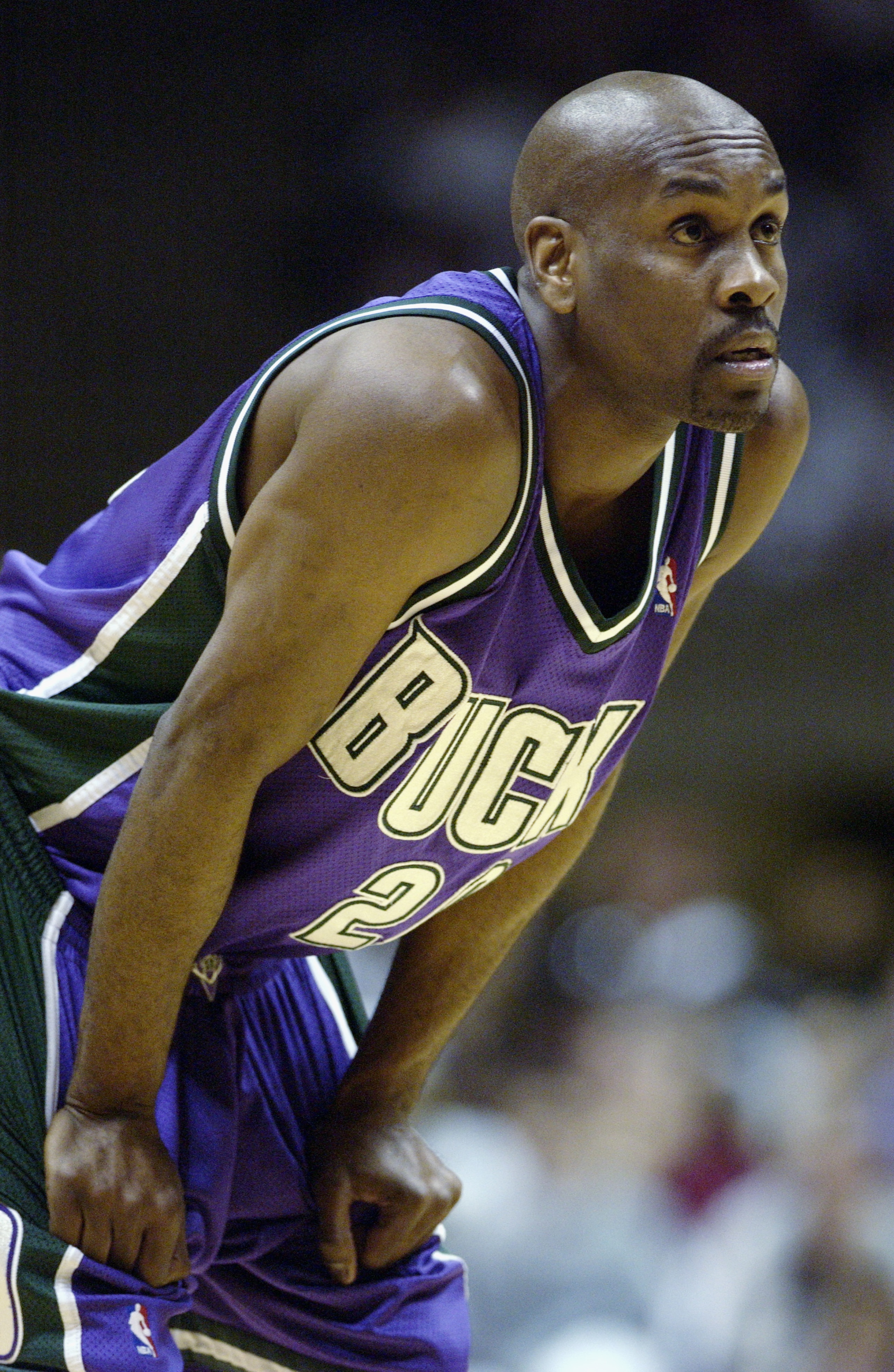 EAST RUTHERFORD, NJ - APRIL 19: Gary Payton #20 of the Milwaukee Bucks rests in Game one of the Eastern Conference Quarterfinals against the New Jersey Nets during the 2003 NBA Playoffs at Continental Airlines Arena on April 19, 2003 in East Rutherford, EAST RUTHERFORD, NJ - APRIL 19: Gary Payton #20 of the Milwaukee Bucks rests in Game one of the Eastern Conference Quarterfinals against the New Jersey Nets during the 2003 NBA Playoffs at Continental Airlines Arena on April 19, 2003 in East Rutherford,