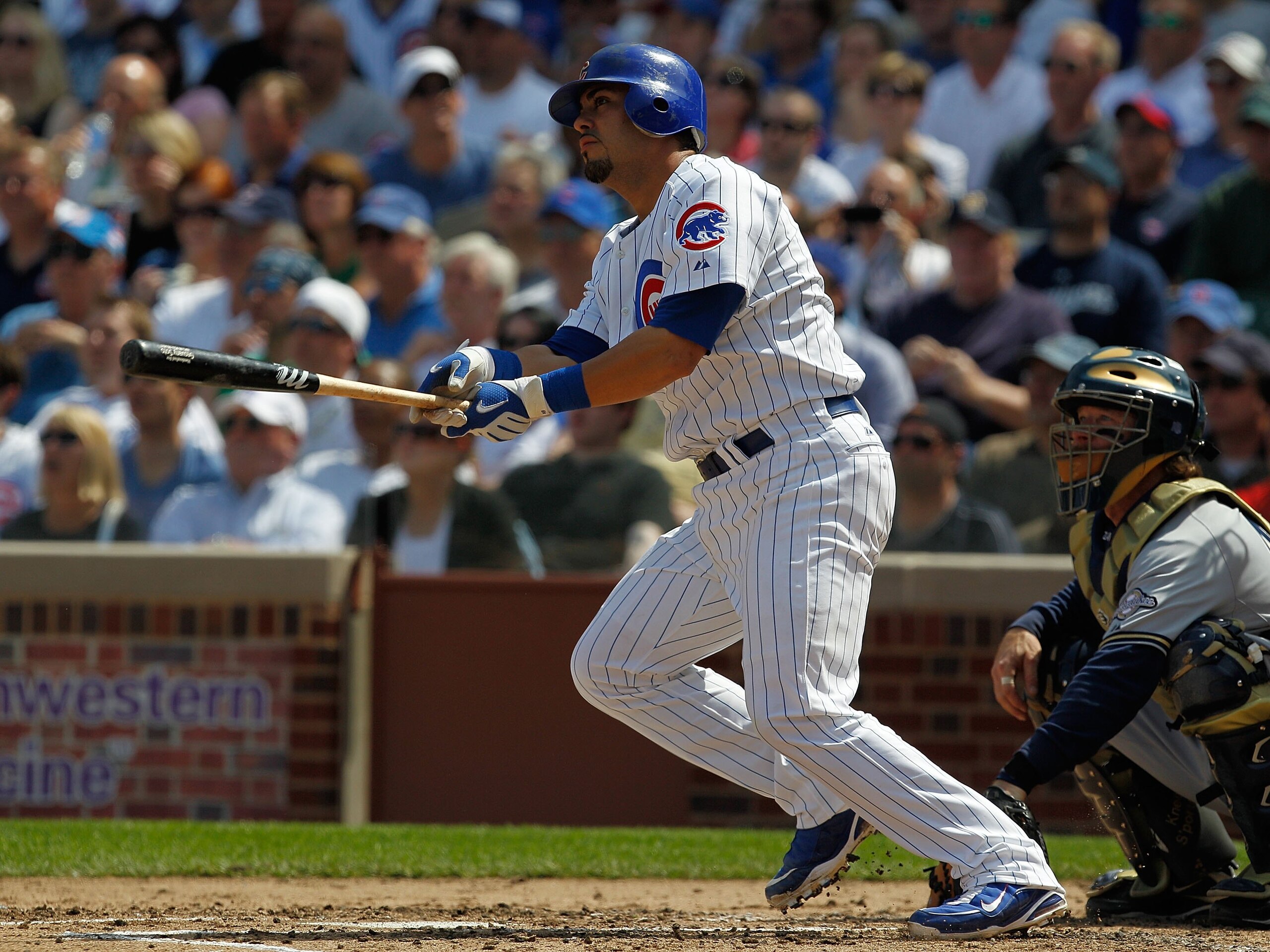 CHICAGO - APRIL 15: Geovany Soto of the Chicago Cubs, wearing a number 42 jersey in honor of Jackie Robinson, hits the ball against the Milwaukee Brewers at Wrigley Field on April 15, 2010 in Chicago, Illinois. The Brewers defeated the Cubs 8-6. (Photo by