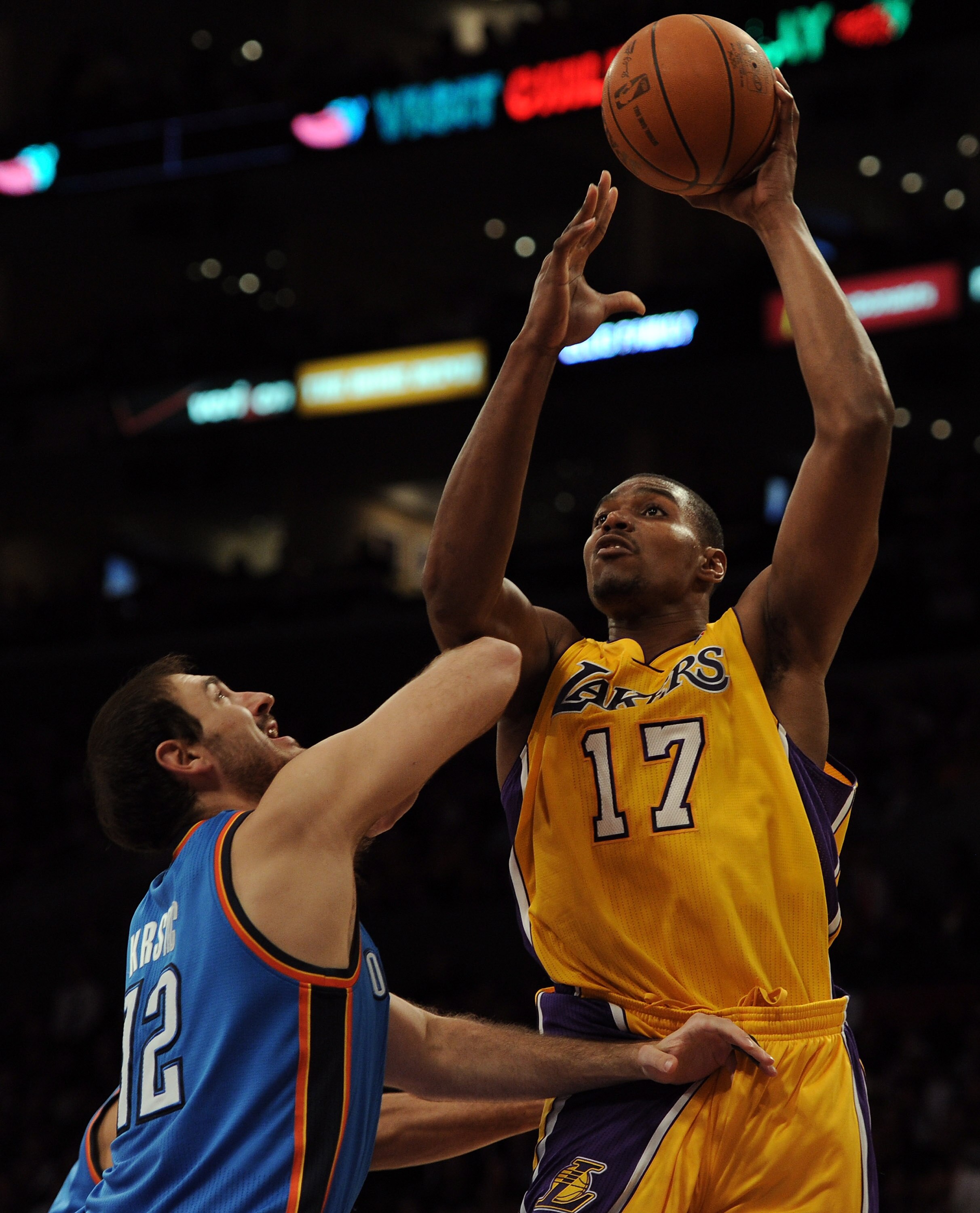LOS ANGELES, CA - JANUARY 17:  Andew Bynum #17 of the Los Angeles Lakers shoots over Nenad Kristic #12 of the Oklahoma City Thunder at the Staples Center on January 17, 2011 in Los Angeles, California.  (Photo by Harry How/Getty Images)   NOTE TO USER: Us