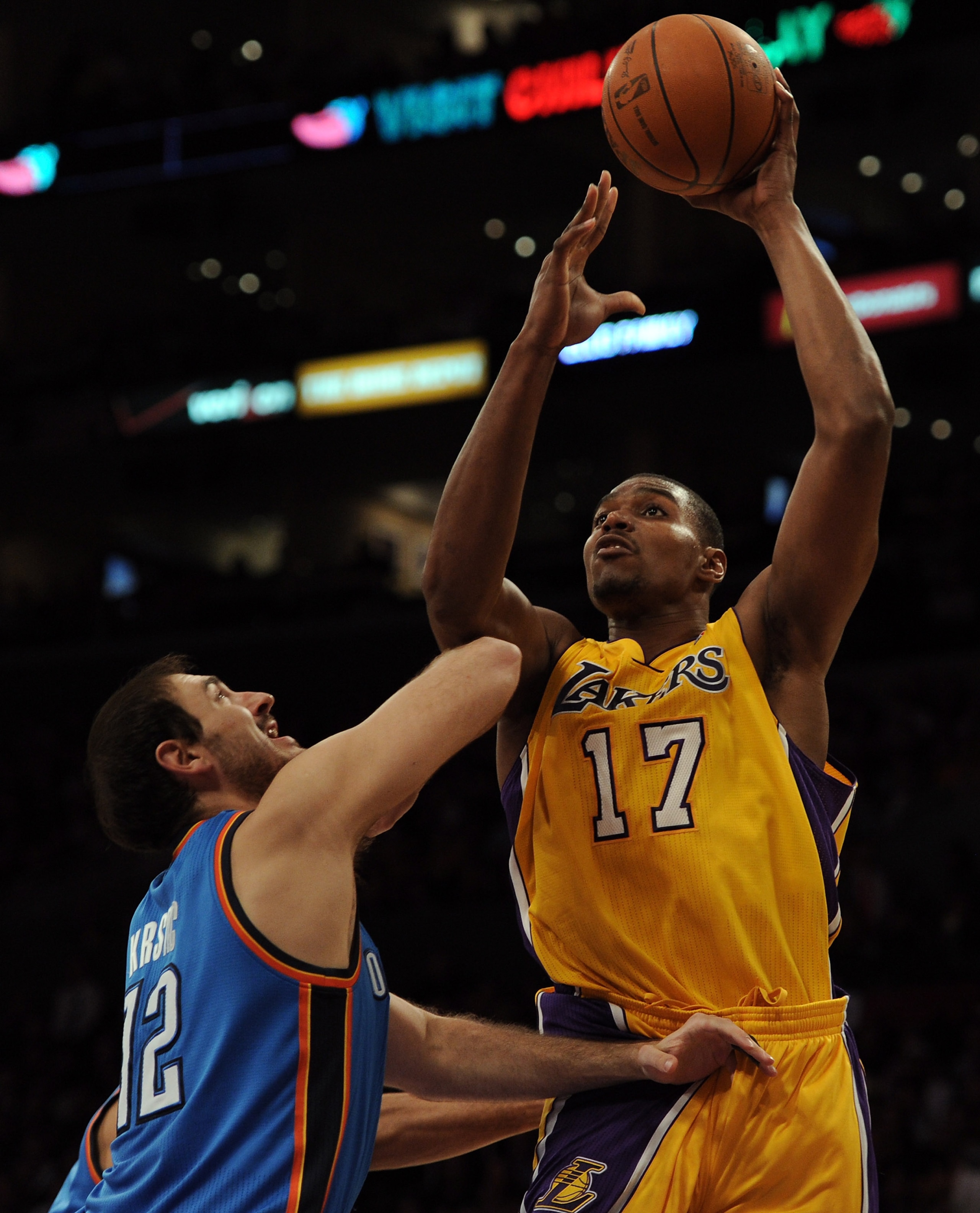 LOS ANGELES, CA - JANUARY 17:  Andew Bynum #17 of the Los Angeles Lakers shoots over Nenad Kristic #12 of the Oklahoma City Thunder at the Staples Center on January 17, 2011 in Los Angeles, California.  (Photo by Harry How/Getty Images)   NOTE TO USER: Us