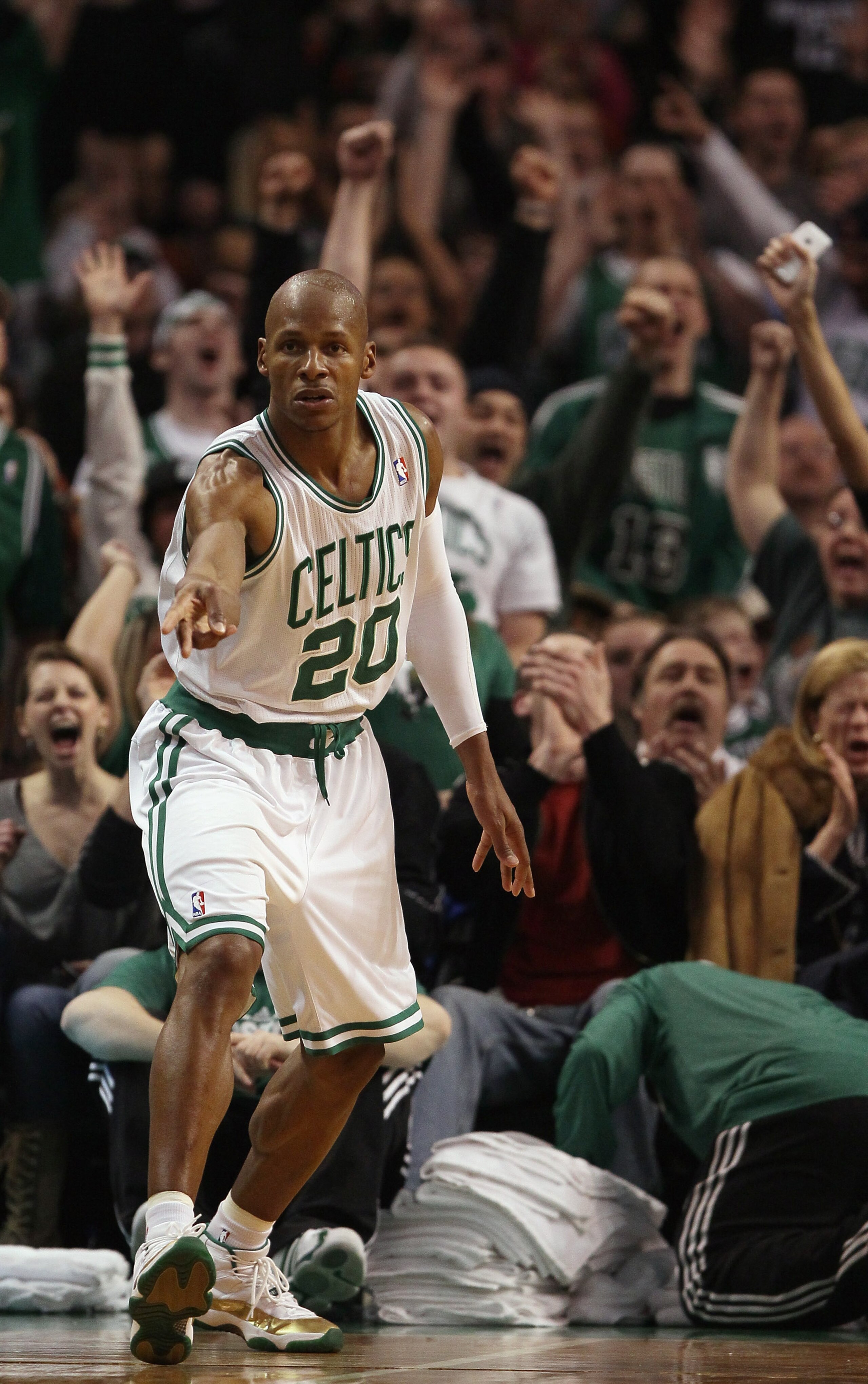 BOSTON, MA - JANUARY 17:  Ray Allen #20 of the Boston Celtics celebrates his three point shot in the fourth quarter against the Orlando Magic on January 17, 2011 at the TD Garden in Boston, Massachusetts. The Celtics defeated the Magic 109-106.  NOTE TO U
