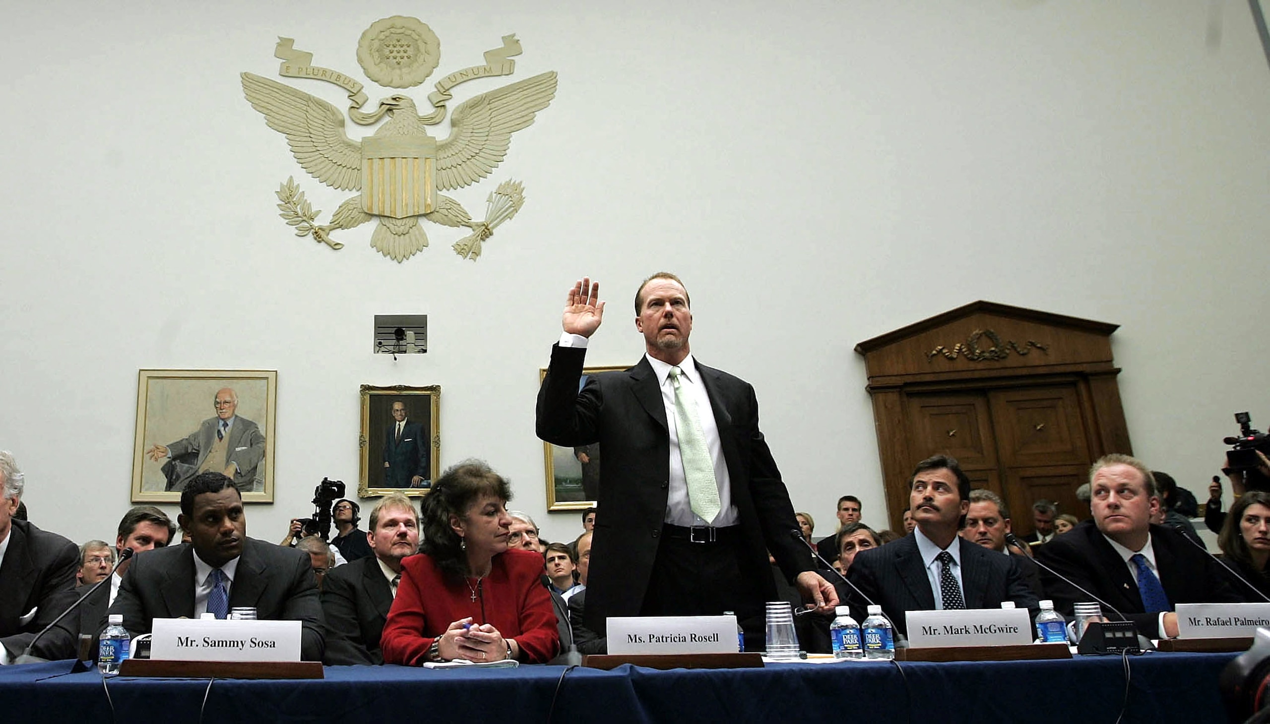 WASHINGTON - MARCH 17: Baseball player Mark McGwire is sworn in as Sammy Sosa (L) and Rafael Palmeiro and Curt Schilling (R) look on March 17, 2005 during a House committee that is investigating the efforts by Major League Baseball to eradicate steroid u WASHINGTON - MARCH 17: Baseball player Mark McGwire is sworn in as Sammy Sosa (L) and Rafael Palmeiro and Curt Schilling (R) look on March 17, 2005 during a House committee that is investigating the efforts by Major League Baseball to eradicate steroid u