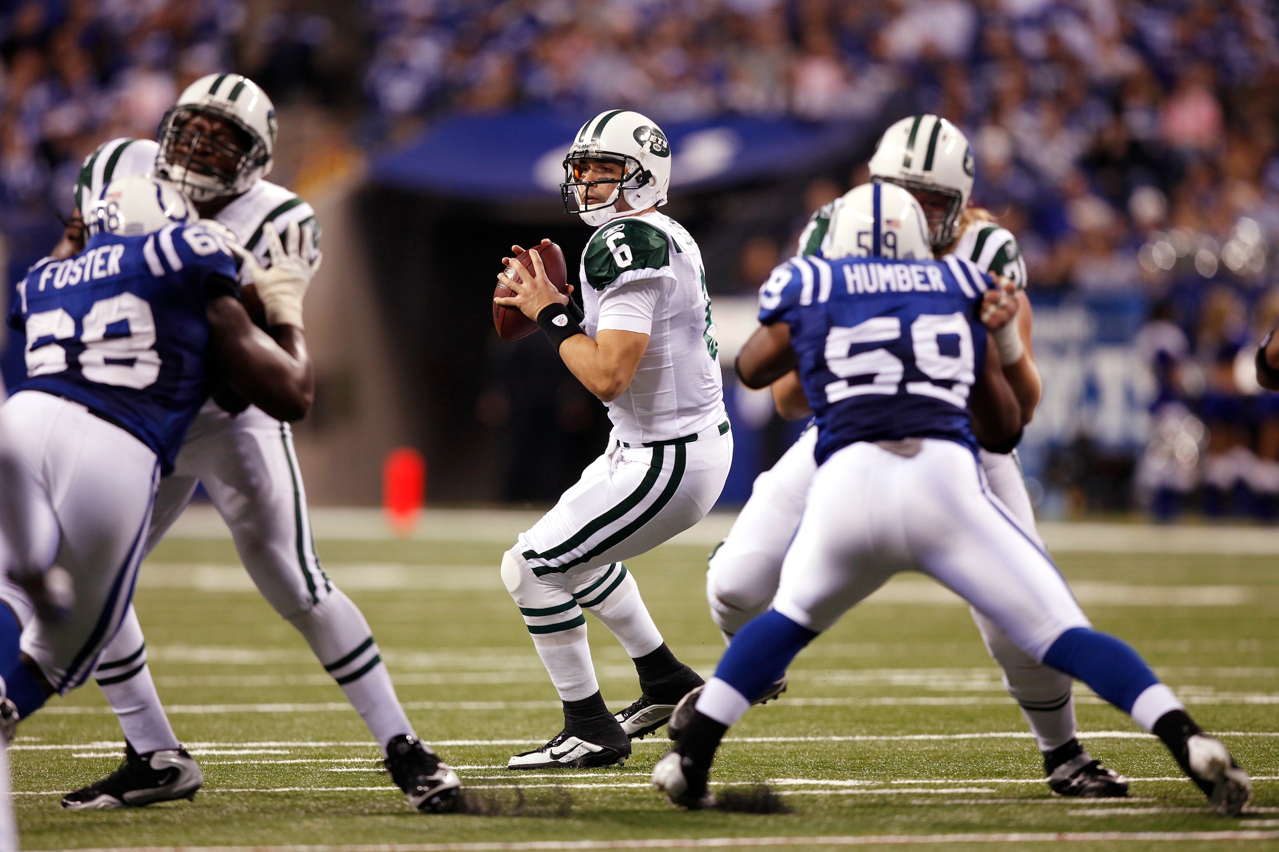 INDIANAPOLIS, IN - DECEMBER 27: Mark Sanchez #6 of the New York Jets looks to pass the football against the Indianapolis Colts at Lucas Oil Stadium on December 27, 2009 in Indianapolis, Indiana. The Jets handed the Colts their first loss of the season, 29 INDIANAPOLIS, IN - DECEMBER 27: Mark Sanchez #6 of the New York Jets looks to pass the football against the Indianapolis Colts at Lucas Oil Stadium on December 27, 2009 in Indianapolis, Indiana. The Jets handed the Colts their first loss of the season, 29