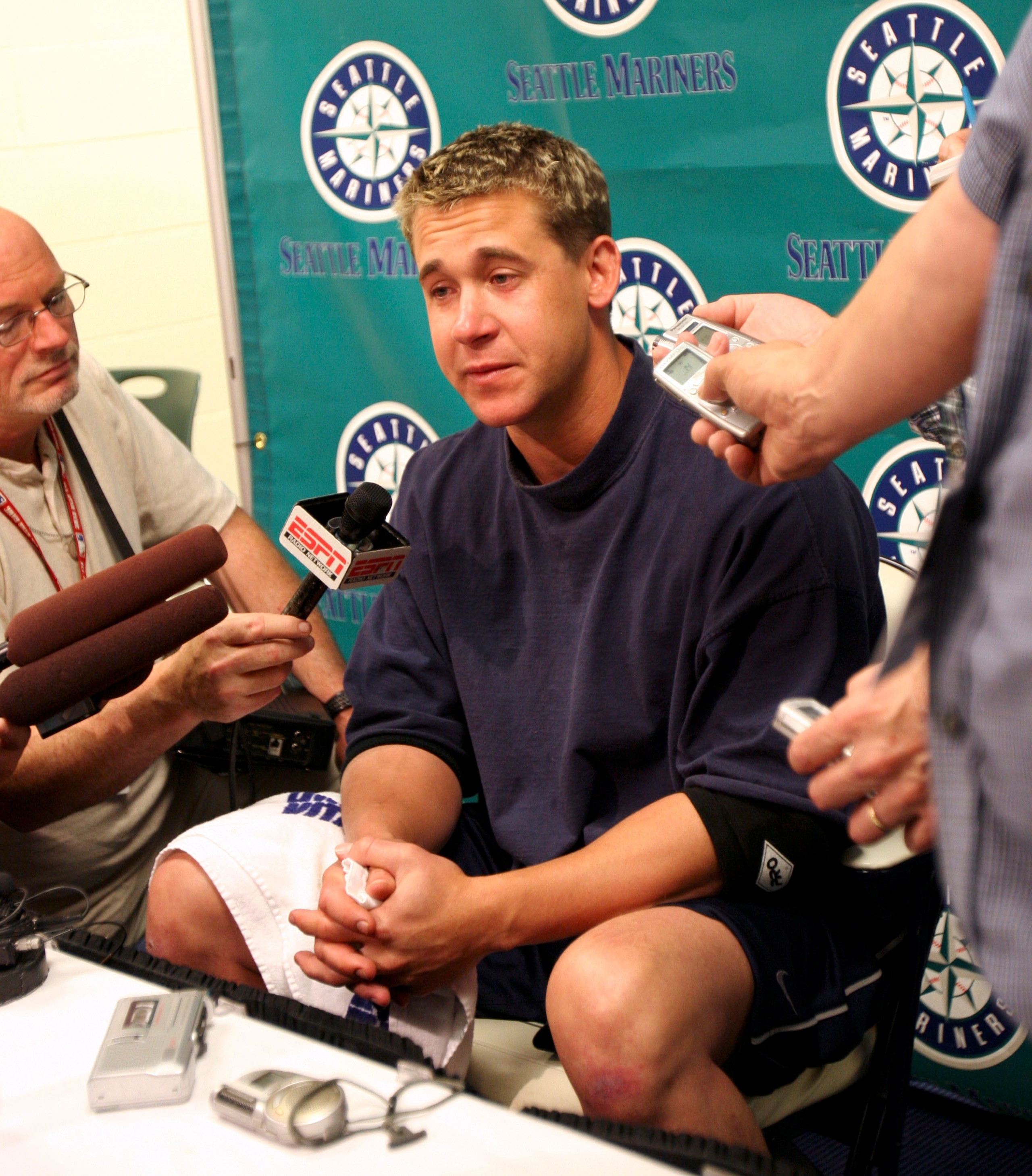 SEATTLE - JULY 3: Bret Boone #29 of the Seattle Mariners talks to the media at a press conference announcing he has been designated for assignment by the Mariners, after a 2-1 victory over the Texas Rangers on July 3, 2005 at Safeco Field in Seattle, Was SEATTLE - JULY 3: Bret Boone #29 of the Seattle Mariners talks to the media at a press conference announcing he has been designated for assignment by the Mariners, after a 2-1 victory over the Texas Rangers on July 3, 2005 at Safeco Field in Seattle, Was