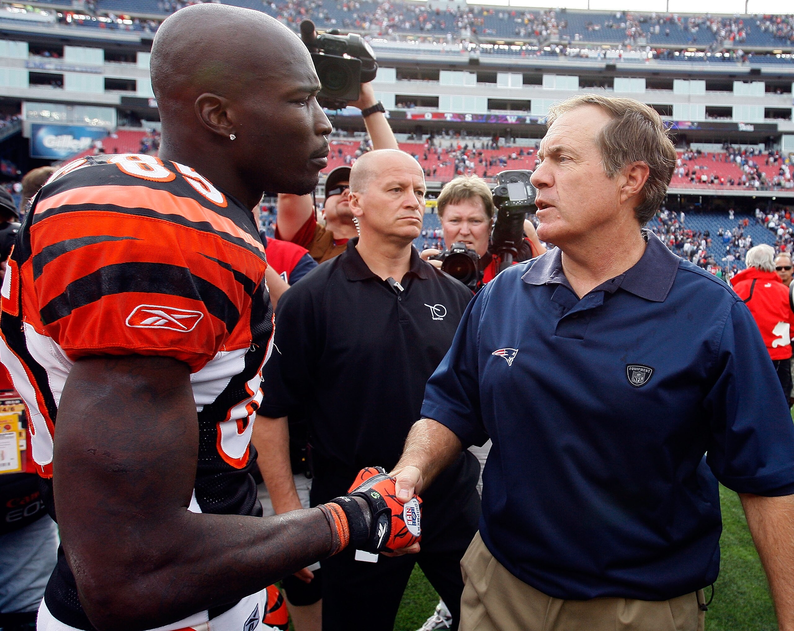FOXBORO, MA - SEPTEMBER 12:  Coach Bill Belichick of the New England Patriots shakes hands with Chad Ochocinco #85 of the Cincinnati Bengals at the completion of  the NFL season opener at Gillette Stadium on September 12, 2010 in Foxboro, Massachusetts. T