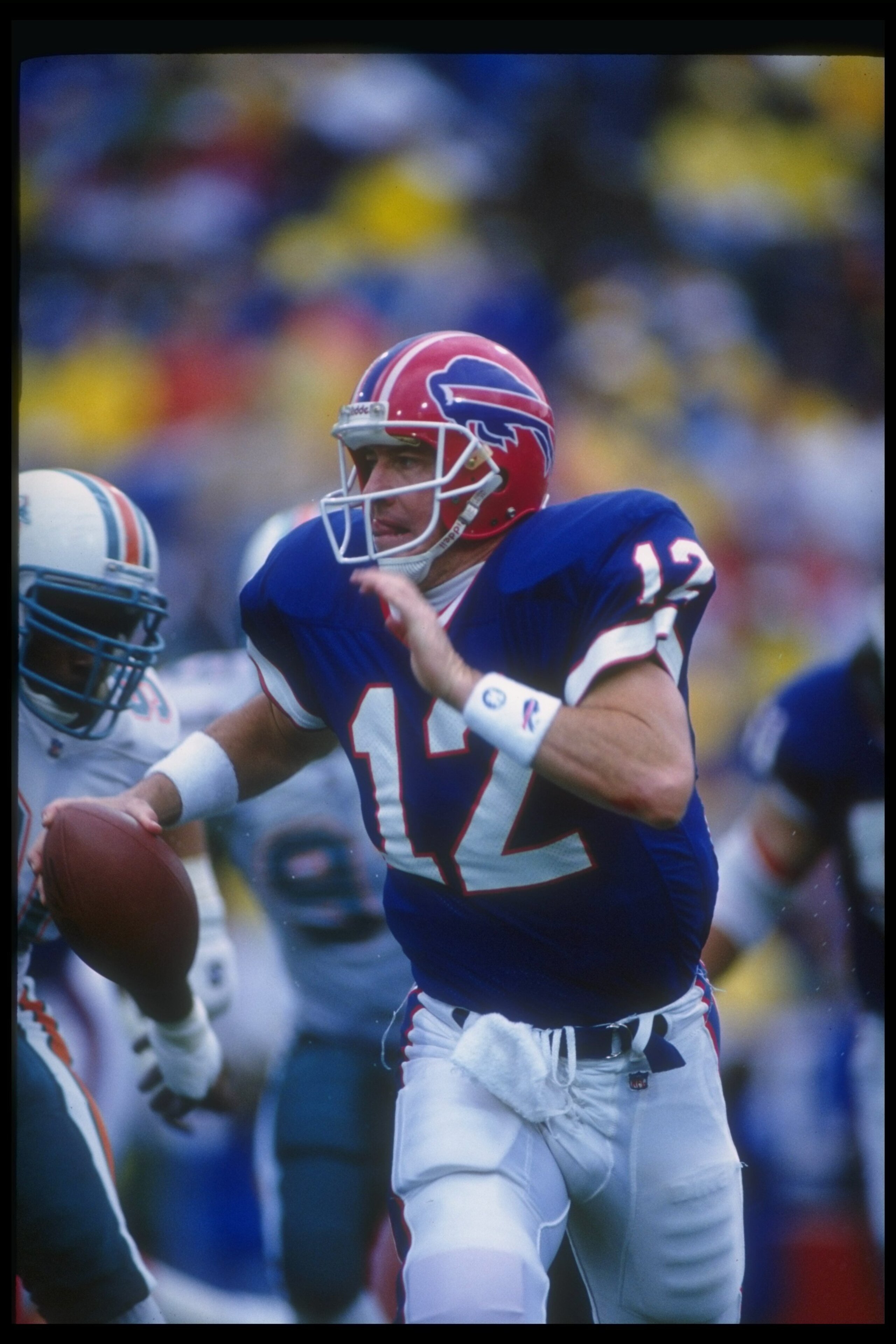 26 Sep 1993:  Quarterback Jim Kelly of the Buffalo Bills looks to pass the ball during a game against the Miami Dolphins at Rich Stadium in Buffalo, New York.  The Dolphins won the game, 22-13. Mandatory Credit: Rick Stewart  /Allsport