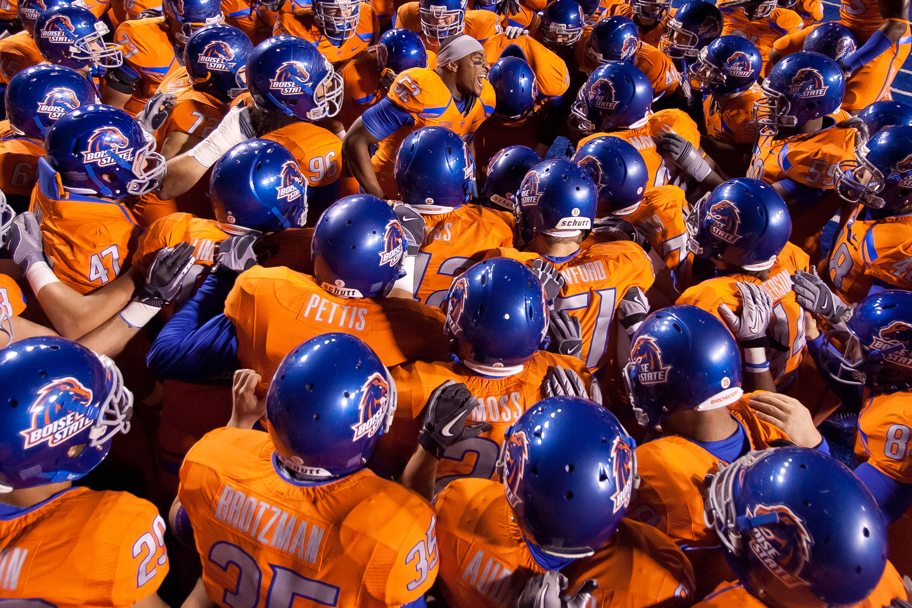 BOISE, ID - NOVEMBER 19:  Derrell Acrey #52 psyches up the Boise State Broncos before the game against the Fresno State Bulldogs at Bronco Stadium on November 19, 2010 in Boise, Idaho.  (Photo by Otto Kitsinger III/Getty Images)
