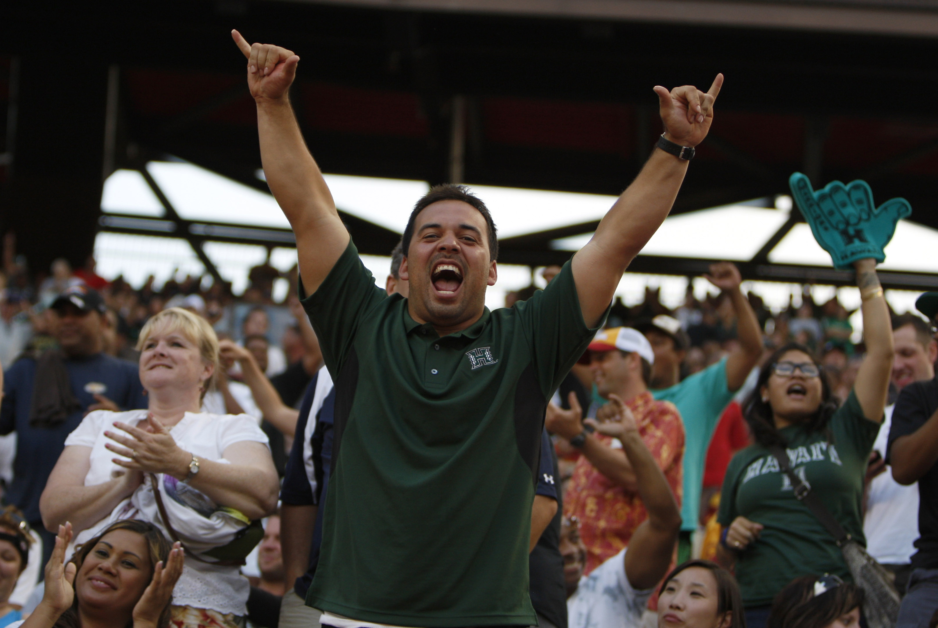 HONOLULU - SEPTEMBER 02: Fans cheer during first half action at Aloha Stadium September 2, 2010 in Honolulu, Hawaii. (Photo by Kent Nishimura/Getty Images)