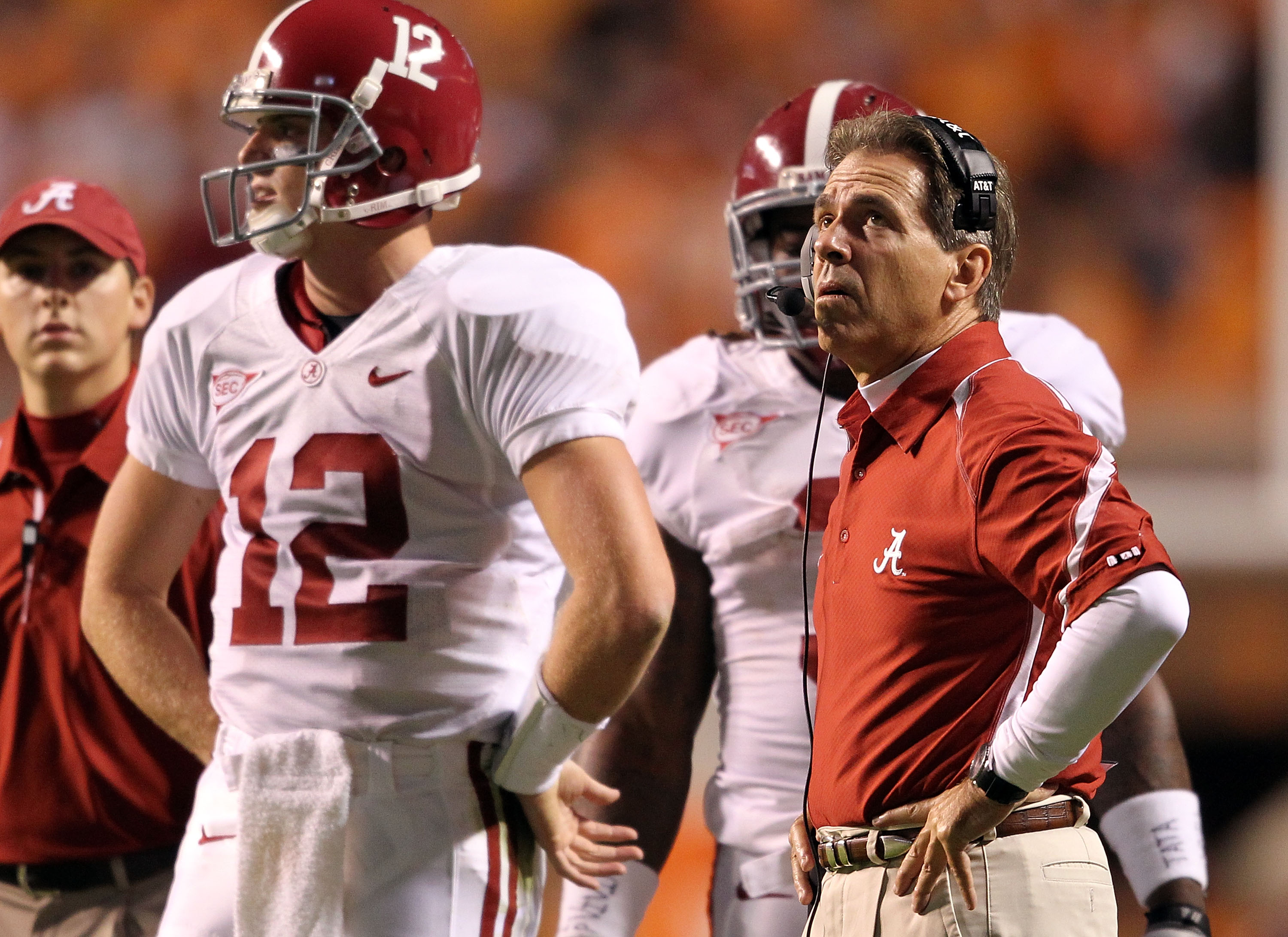KNOXVILLE, TN - OCTOBER 23: Greg McElroy #12 and Nick Saban the Head Coach of the Alabama Crimson Tide are pictured during a timeout in the SEC game against the Tennessee Volunteers at Neyland Stadium on October 23, 2010 in Knoxville, Tennessee.  (Photo b
