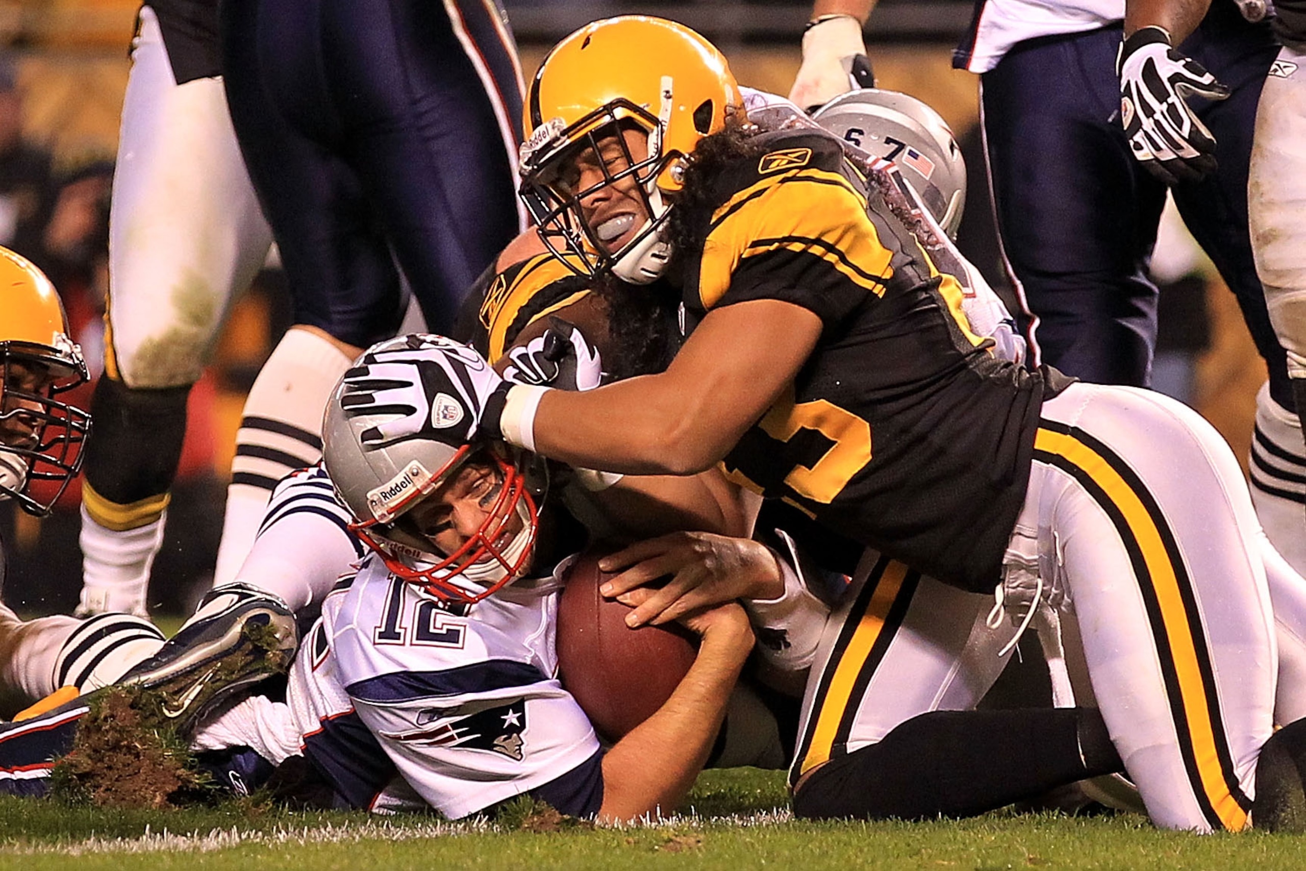 PITTSBURGH - NOVEMBER 14: Tom Brady #12 of the New England Patriots scores a touchdown under pressure from Troy Polamalu #43 of the Pittsburgh Steelers on November 14, 2010 at Heinz Field in Pittsburgh, Pennsylvania. (Photo by Chris McGrath/Getty Images PITTSBURGH - NOVEMBER 14: Tom Brady #12 of the New England Patriots scores a touchdown under pressure from Troy Polamalu #43 of the Pittsburgh Steelers on November 14, 2010 at Heinz Field in Pittsburgh, Pennsylvania. (Photo by Chris McGrath/Getty Images