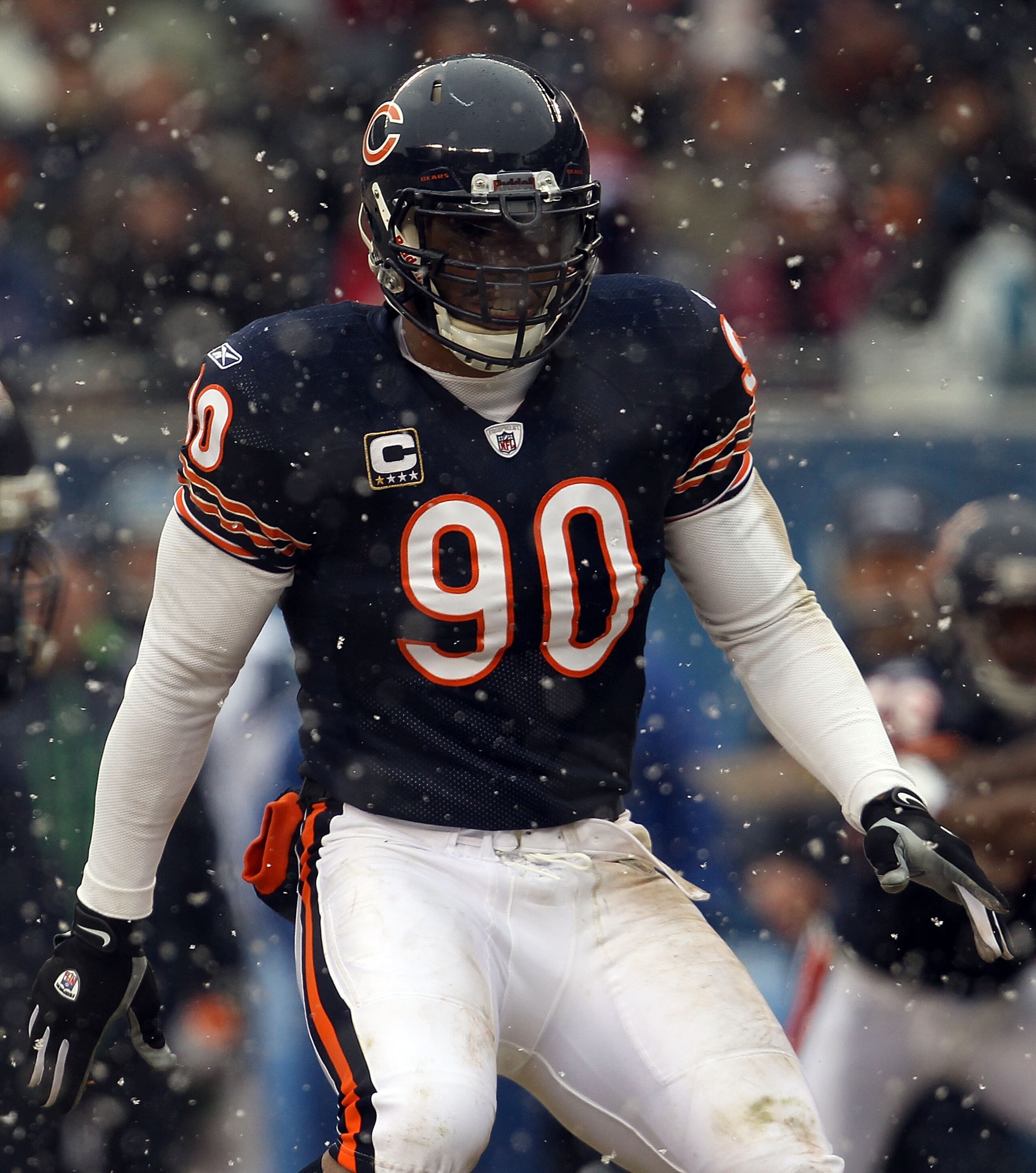 CHICAGO, IL - JANUARY 16:  Julius Peppers #90 of the Chicago Bears looks on against the Seattle Seahawks in the 2011 NFC divisional playoff game at Soldier Field on January 16, 2011 in Chicago, Illinois.  (Photo by Jonathan Daniel/Getty Images)