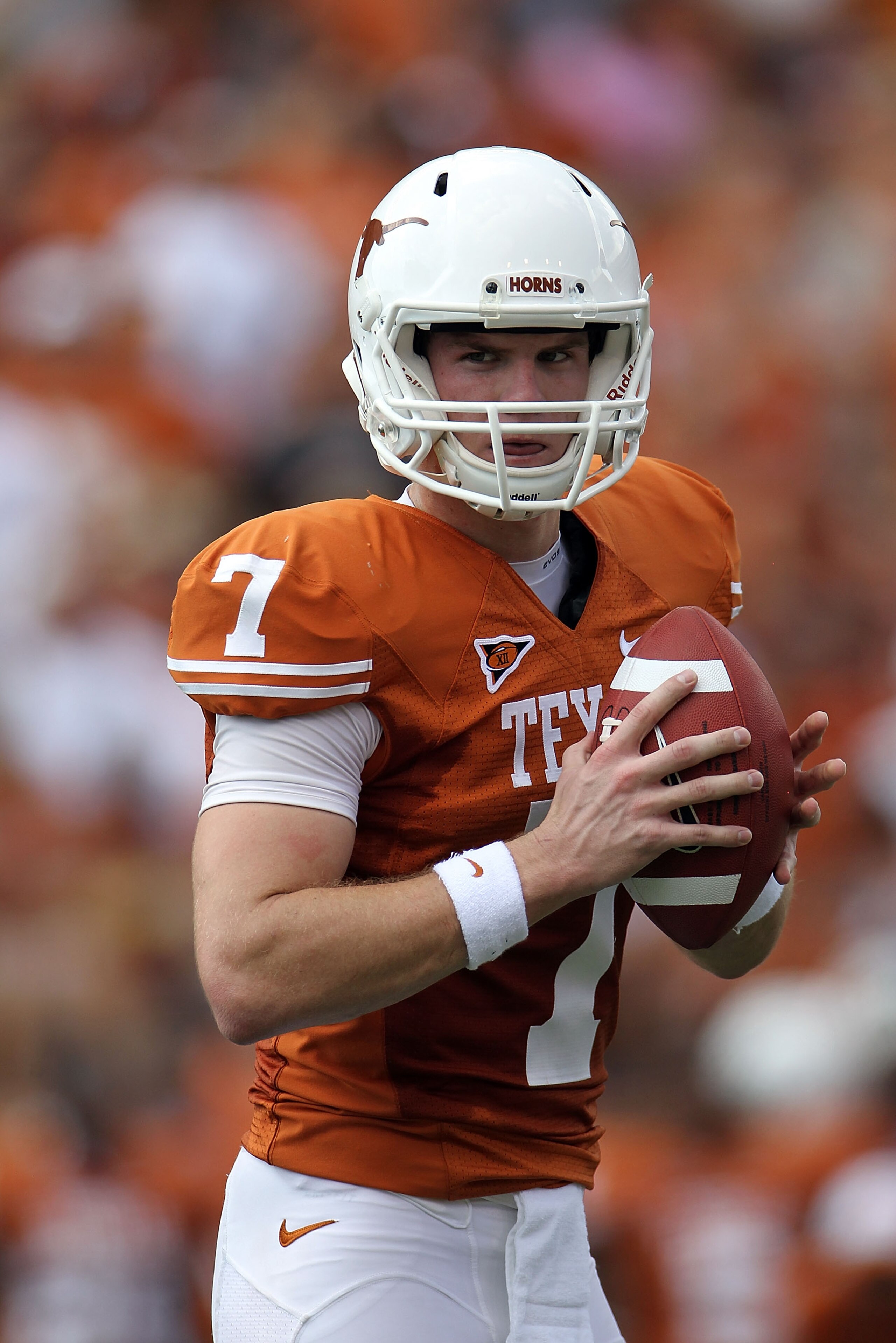 AUSTIN, TX - SEPTEMBER 25:  Quarterback Garrett Gilbert #7 of the Texas Longhorns looks to pass against the UCLA Bruins at Darrell K Royal-Texas Memorial Stadium on September 25, 2010 in Austin, Texas.  (Photo by Ronald Martinez/Getty Images)
