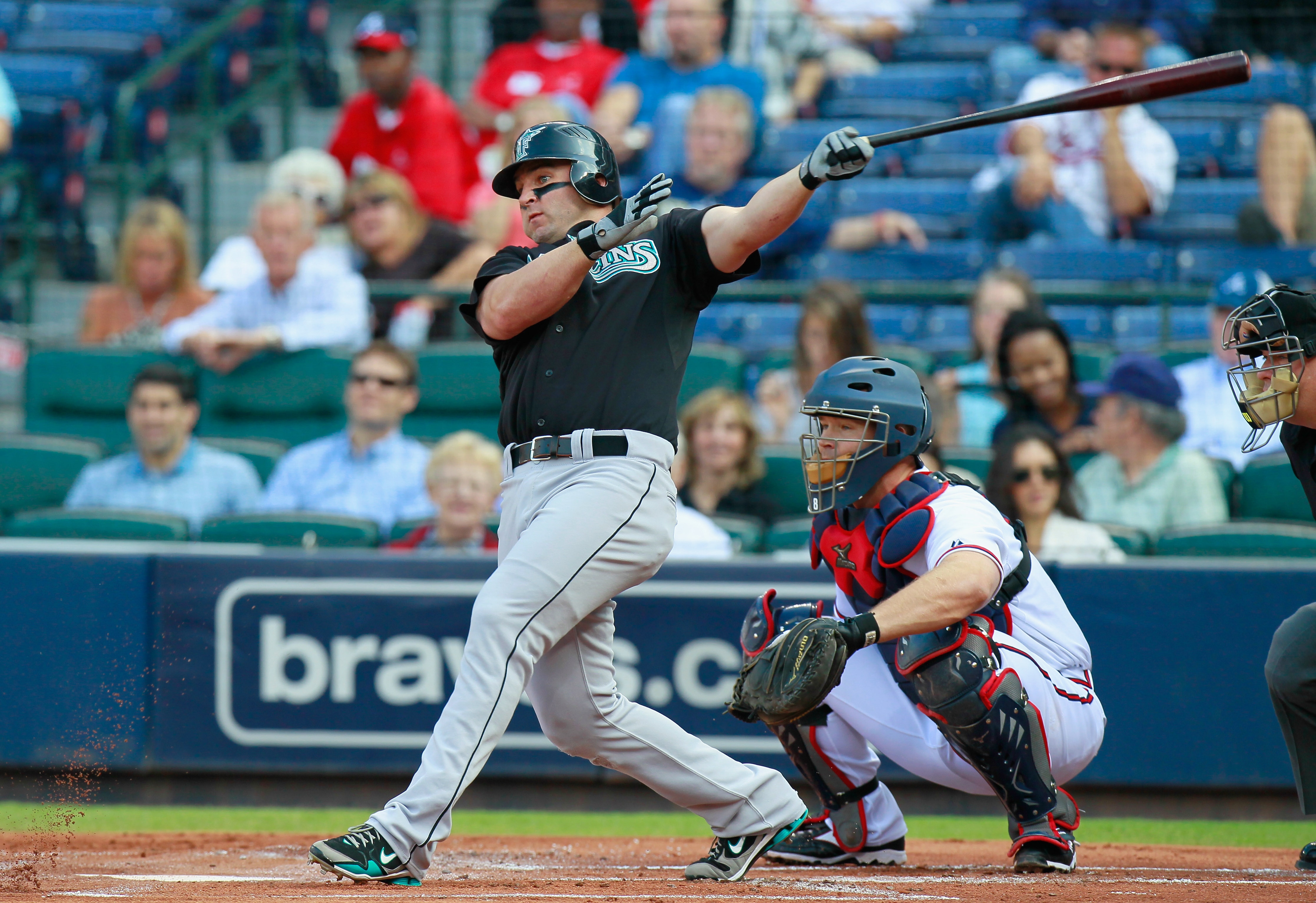 ATLANTA - SEPTEMBER 29: Dan Uggla #6 of the Florida Marlins against David Ross #8 of the Atlanta Braves at Turner Field on September 29, 2010 in Atlanta, Georgia. (Photo by Kevin C. Cox/Getty Images)