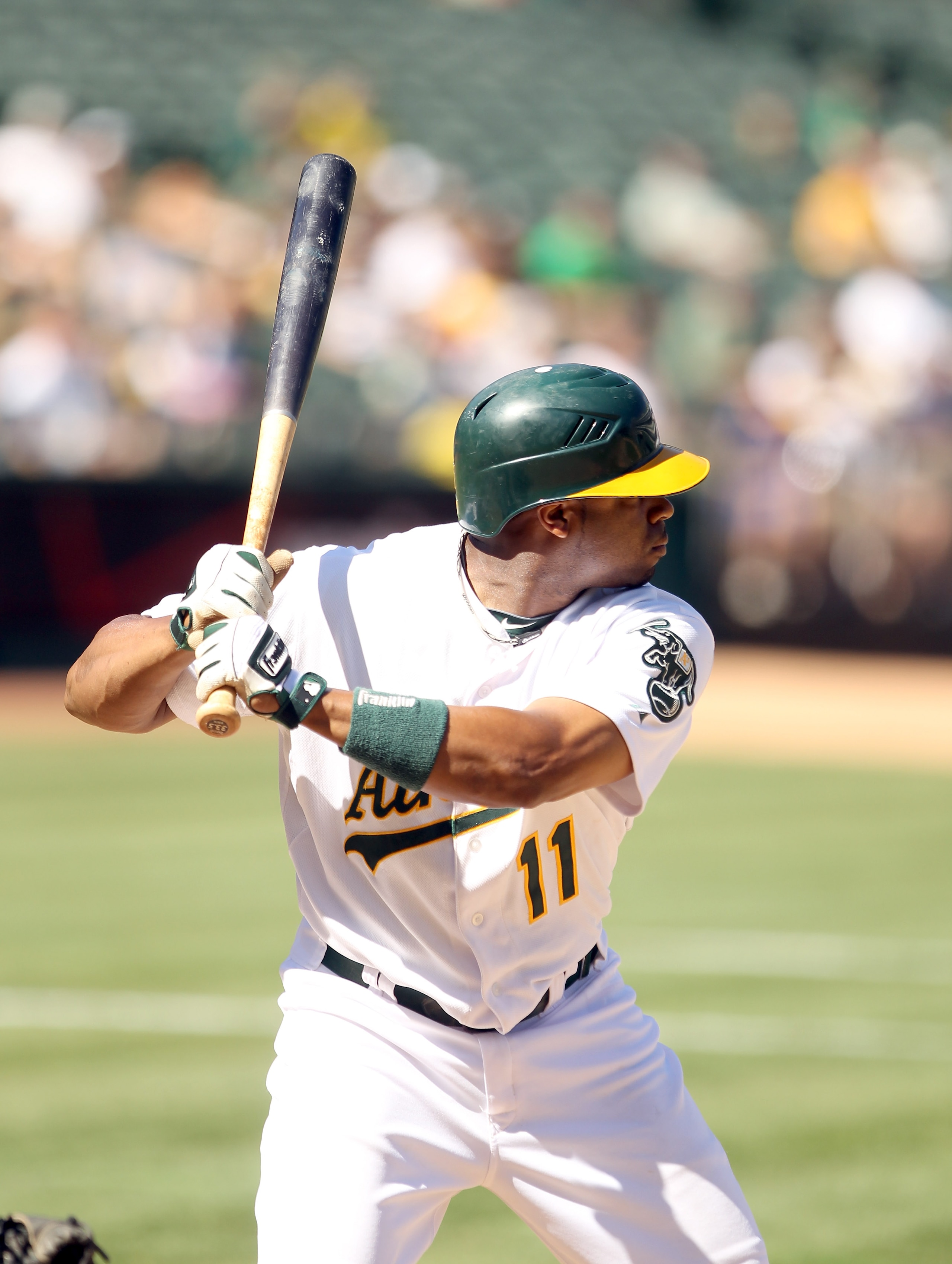OAKLAND, CA - SEPTEMBER 06: Rajai Davis #11 of the Oakland Athletics bats against the Seattle Mariners at the Oakland-Alameda County Coliseum on September 6, 2010 in Oakland, California. (Photo by Ezra Shaw/Getty Images) OAKLAND, CA - SEPTEMBER 06: Rajai Davis #11 of the Oakland Athletics bats against the Seattle Mariners at the Oakland-Alameda County Coliseum on September 6, 2010 in Oakland, California. (Photo by Ezra Shaw/Getty Images)
