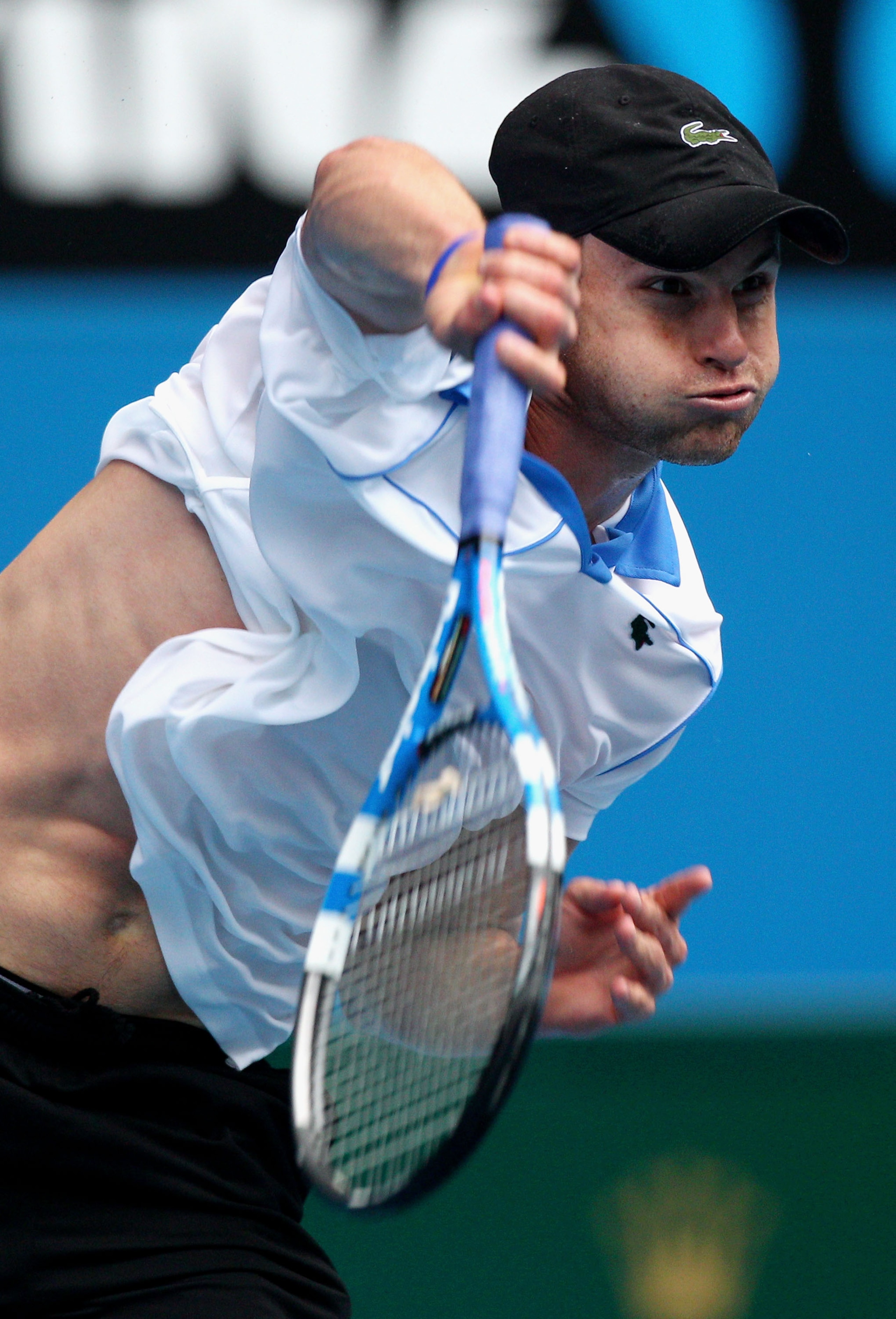 MELBOURNE, AUSTRALIA - JANUARY 17:  Andy Roddick of the United States of America serves in his first round match against Jan Hajek of the Czech Republic during day one of the 2011 Australian Open at Melbourne Park on January 17, 2011 in Melbourne, Austral
