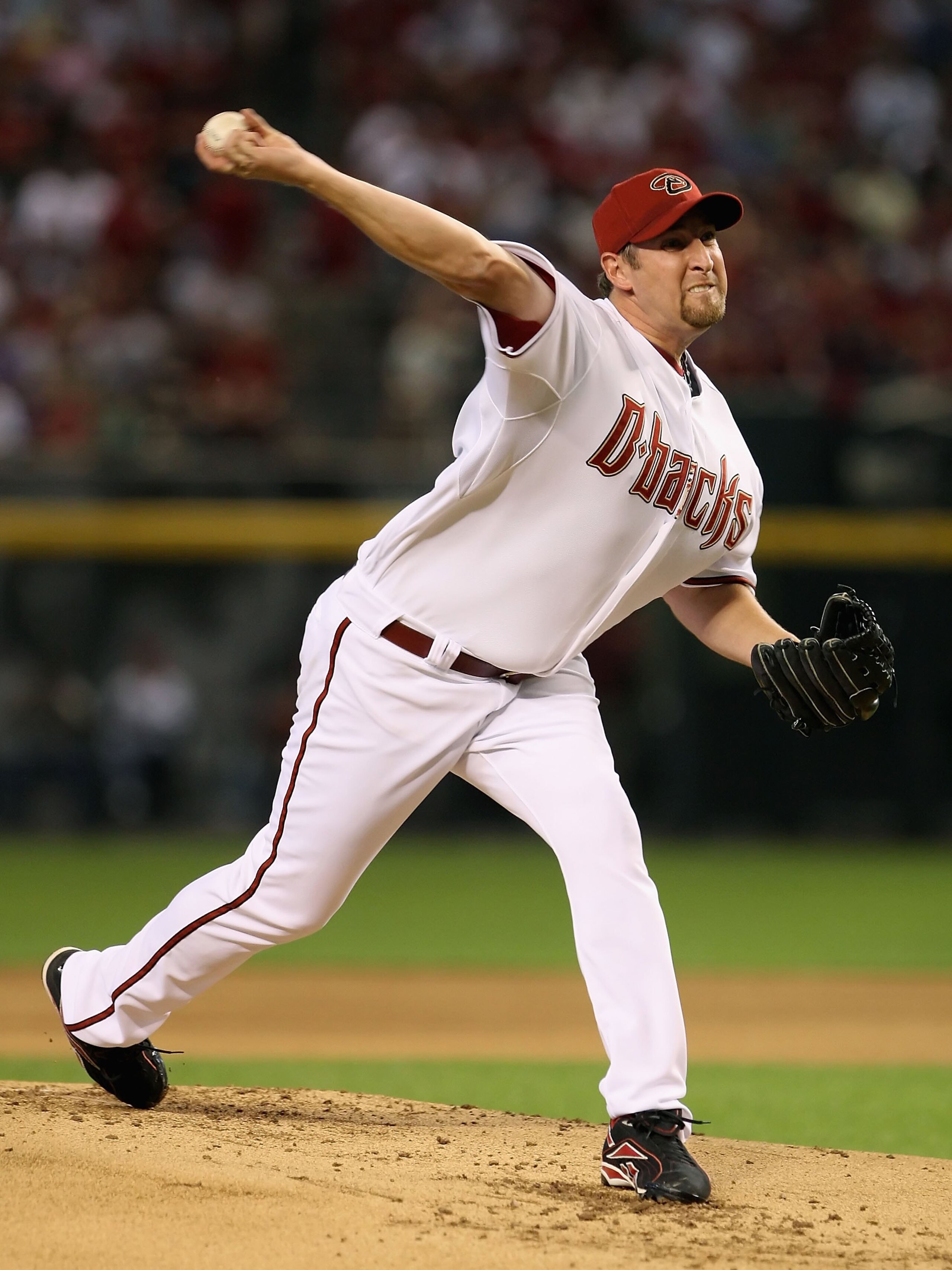 PHOENIX - APRIL 06: Starting pitcher Brandon Webb #17 of the Arizona Diamondbacks pitches against the Colorado Rockies during the MLB openning day game at Chase Field on April 6, 2009 in Phoenix, Arizona. The Diamondbacks defeated the Rockies 9-8. (Pho PHOENIX - APRIL 06: Starting pitcher Brandon Webb #17 of the Arizona Diamondbacks pitches against the Colorado Rockies during the MLB openning day game at Chase Field on April 6, 2009 in Phoenix, Arizona. The Diamondbacks defeated the Rockies 9-8. (Pho
