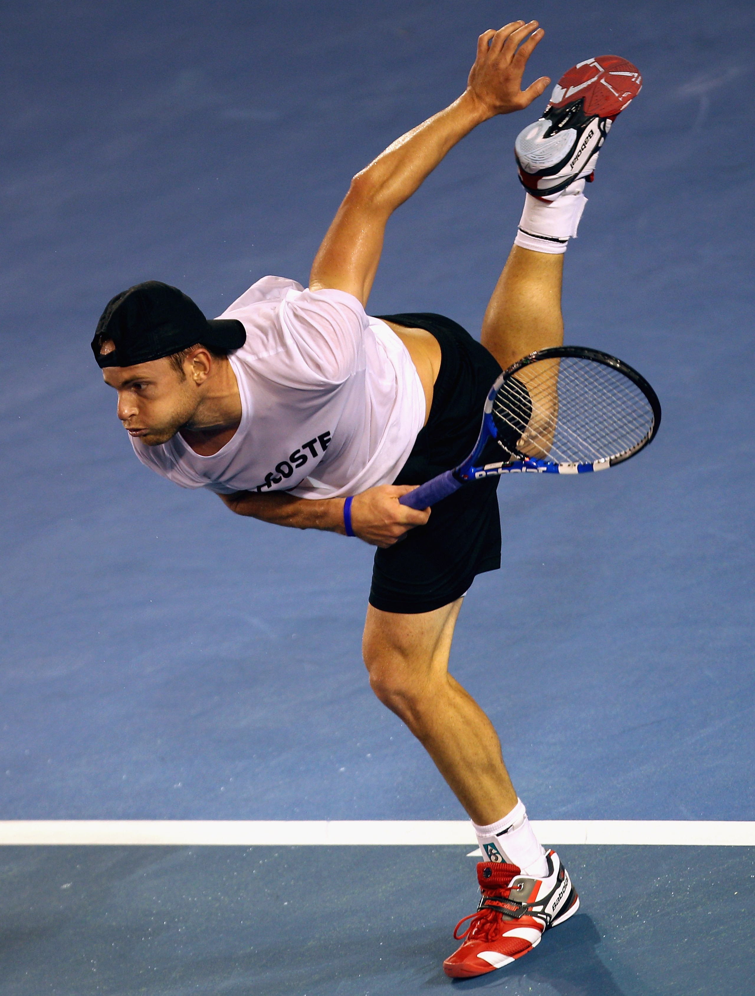 MELBOURNE, AUSTRALIA - JANUARY 12:  Andy Roddick of the USA hits a serve during a practice session ahead of the 2011 Australian Open at Melbourne Park on January 12, 2011 in Melbourne, Australia.  (Photo by Mark Dadswell/Getty Images)