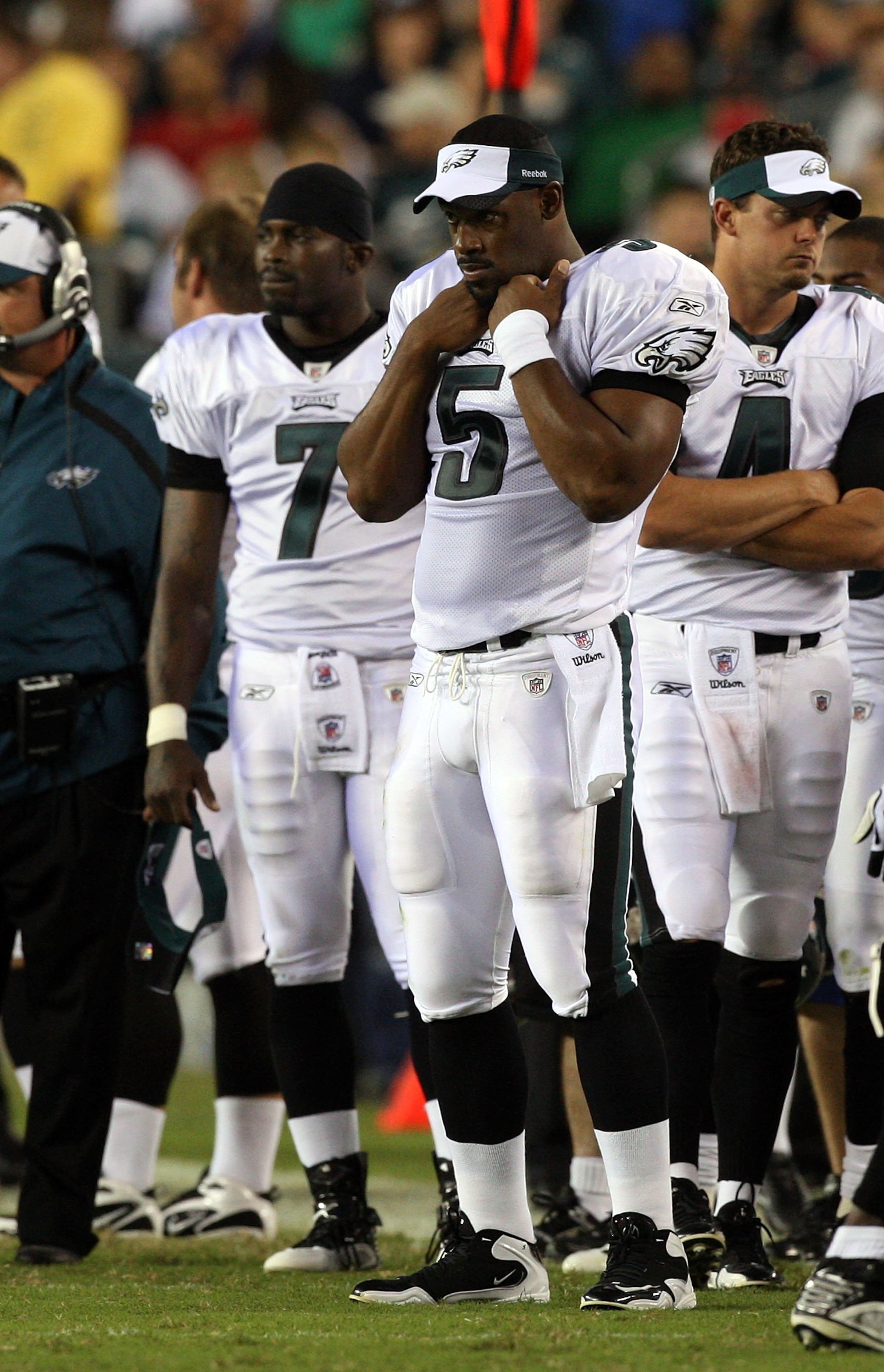 PHILADELPHIA - AUGUST 27: Donovan McNabb #5, Michael Vick #7, and Kevin Kolb #4 of the Philadelphia Eagles look on from the sidelines against the Jacksonville Jaguars on August 27, 2009 at Lincoln Financial Field in Philadelphia, Pennsylvania. (Photo by PHILADELPHIA - AUGUST 27: Donovan McNabb #5, Michael Vick #7, and Kevin Kolb #4 of the Philadelphia Eagles look on from the sidelines against the Jacksonville Jaguars on August 27, 2009 at Lincoln Financial Field in Philadelphia, Pennsylvania. (Photo by
