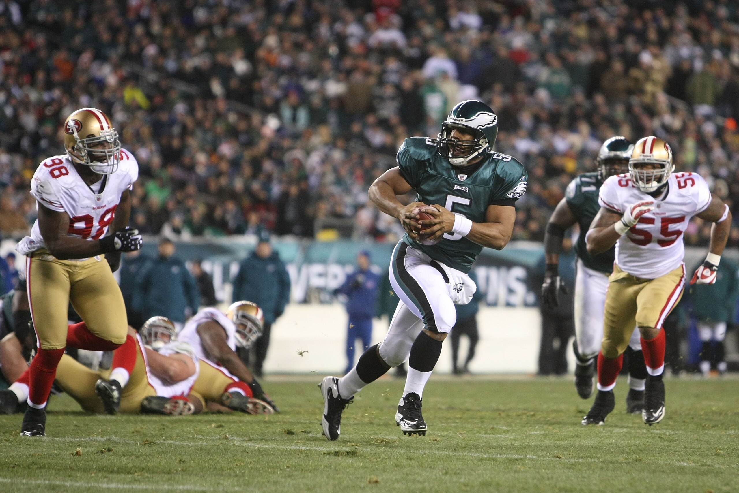 PHILADELPHIA - DECEMBER 20: Donovan McNabb #5 of the Philadelphia Eagles rushes on his way to a touchdown against the San Francisco 49ers at Lincoln Financial Field on December 20, 2009 in Philadelphia, Pennsylvania. (Photo by Nick Laham/Getty Images) PHILADELPHIA - DECEMBER 20: Donovan McNabb #5 of the Philadelphia Eagles rushes on his way to a touchdown against the San Francisco 49ers at Lincoln Financial Field on December 20, 2009 in Philadelphia, Pennsylvania. (Photo by Nick Laham/Getty Images)