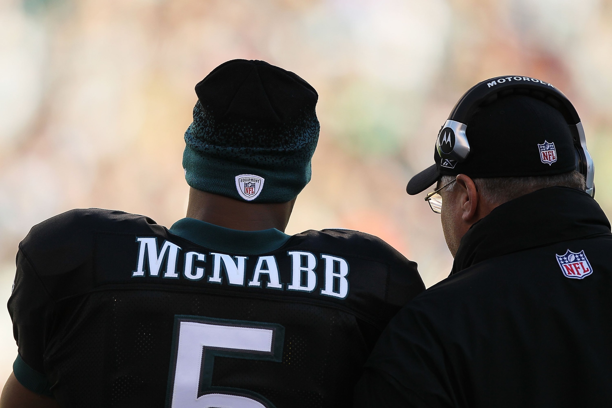 PHILADELPHIA - NOVEMBER 29: Donovan McNabb #5 of the Philadelphia Eagles stands with Head Coach Andy Reid from the sidelines against the Washington Redskins during their game at Lincoln Financial Field on November 29, 2009 in Philadelphia, Pennsylvania. PHILADELPHIA - NOVEMBER 29: Donovan McNabb #5 of the Philadelphia Eagles stands with Head Coach Andy Reid from the sidelines against the Washington Redskins during their game at Lincoln Financial Field on November 29, 2009 in Philadelphia, Pennsylvania.