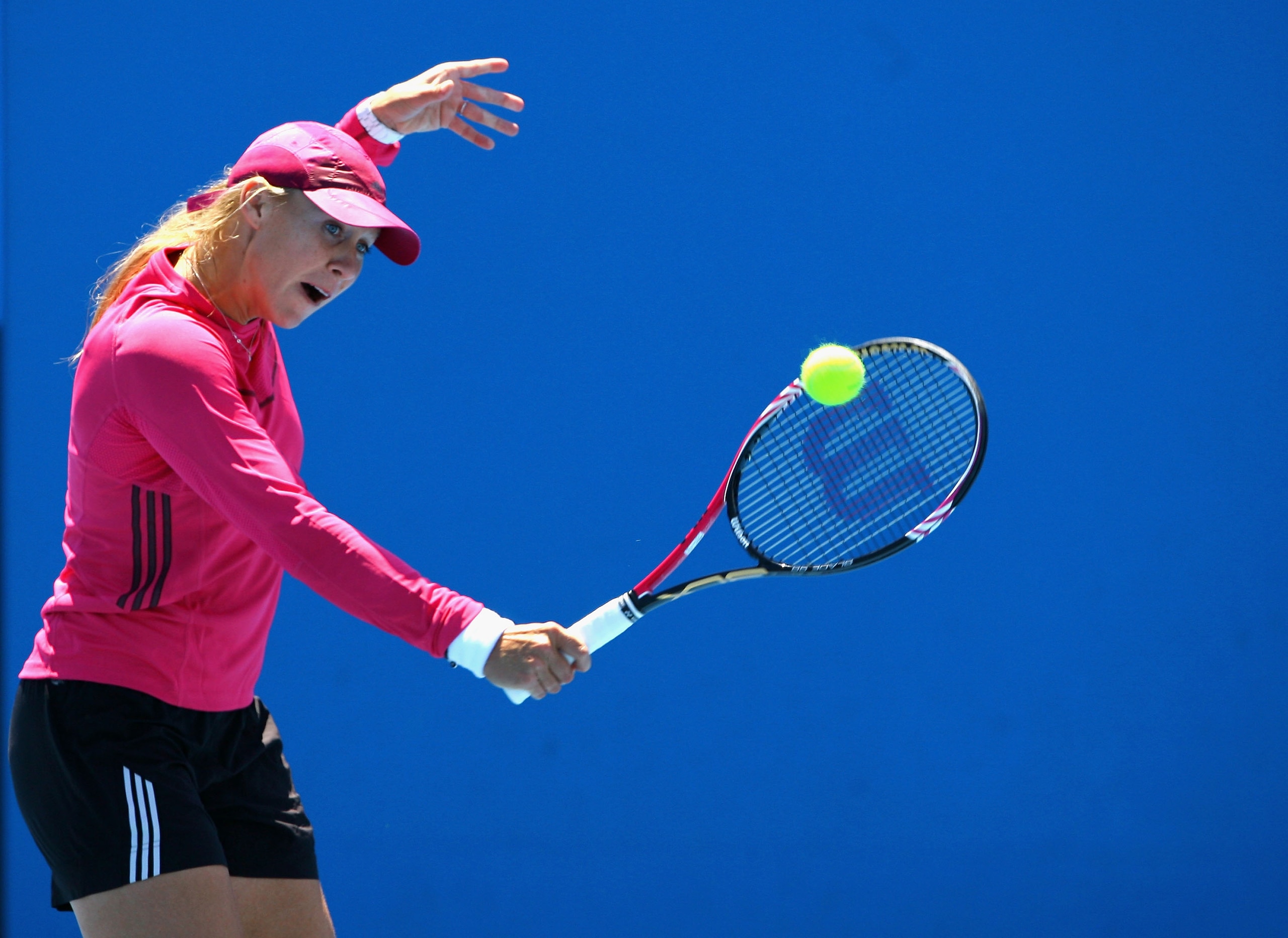 MELBOURNE, AUSTRALIA - JANUARY 19:  Alicia Molik  of Australia plays a backhand during a training session ahead of her second round match tomorrow during day three of the 2011 Australian Open at Melbourne Park on January 19, 2011 in Melbourne, Australia.