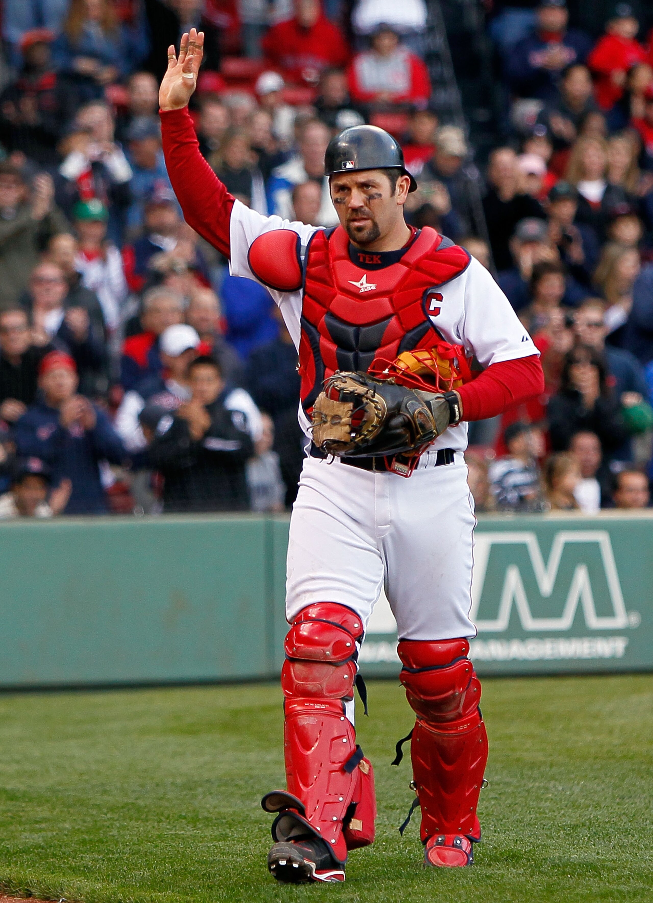 BOSTON - OCTOBER 3: Jason Varitek #33 of the Boston Red Sox reacts to fan applause as he leaves the field for a replacement in the ninth inning against the New York Yankees at Fenway Park, October 3, 2010, in Boston, Massachusetts. The Red Sox won 8-4. BOSTON - OCTOBER 3: Jason Varitek #33 of the Boston Red Sox reacts to fan applause as he leaves the field for a replacement in the ninth inning against the New York Yankees at Fenway Park, October 3, 2010, in Boston, Massachusetts. The Red Sox won 8-4.