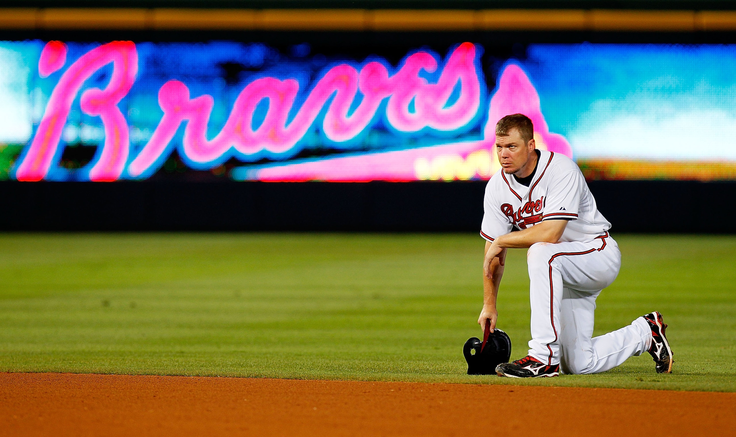 ATLANTA - JUNE 30: Chipper Jones #10 of the Atlanta Braves kneels behind second base during a pitching change by the Washington Nationals at Turner Field on June 30, 2010 in Atlanta, Georgia. (Photo by Kevin C. Cox/Getty Images) ATLANTA - JUNE 30: Chipper Jones #10 of the Atlanta Braves kneels behind second base during a pitching change by the Washington Nationals at Turner Field on June 30, 2010 in Atlanta, Georgia. (Photo by Kevin C. Cox/Getty Images)