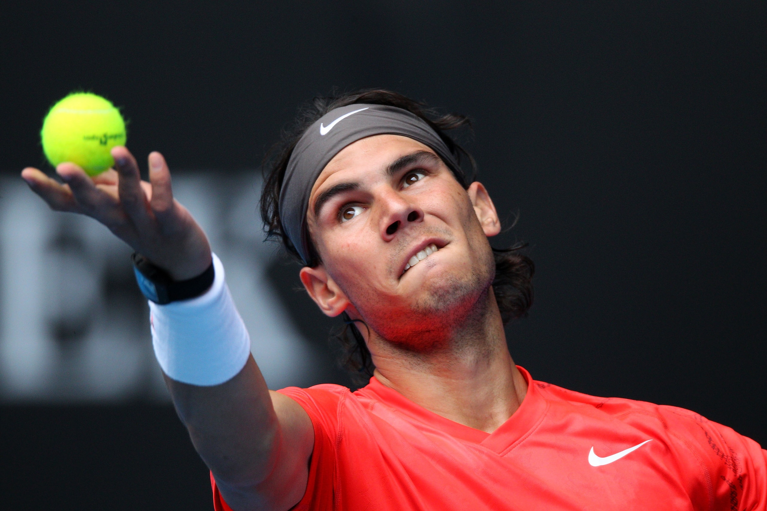 MELBOURNE, AUSTRALIA - JANUARY 18: Rafael Nadal of Spain serves during his first round match against Marcos Daniel of Brazil during day two of the 2011 Australian Open at Melbourne Park on January 18, 2011 in Melbourne, Australia. (Photo by Scott Barbour/