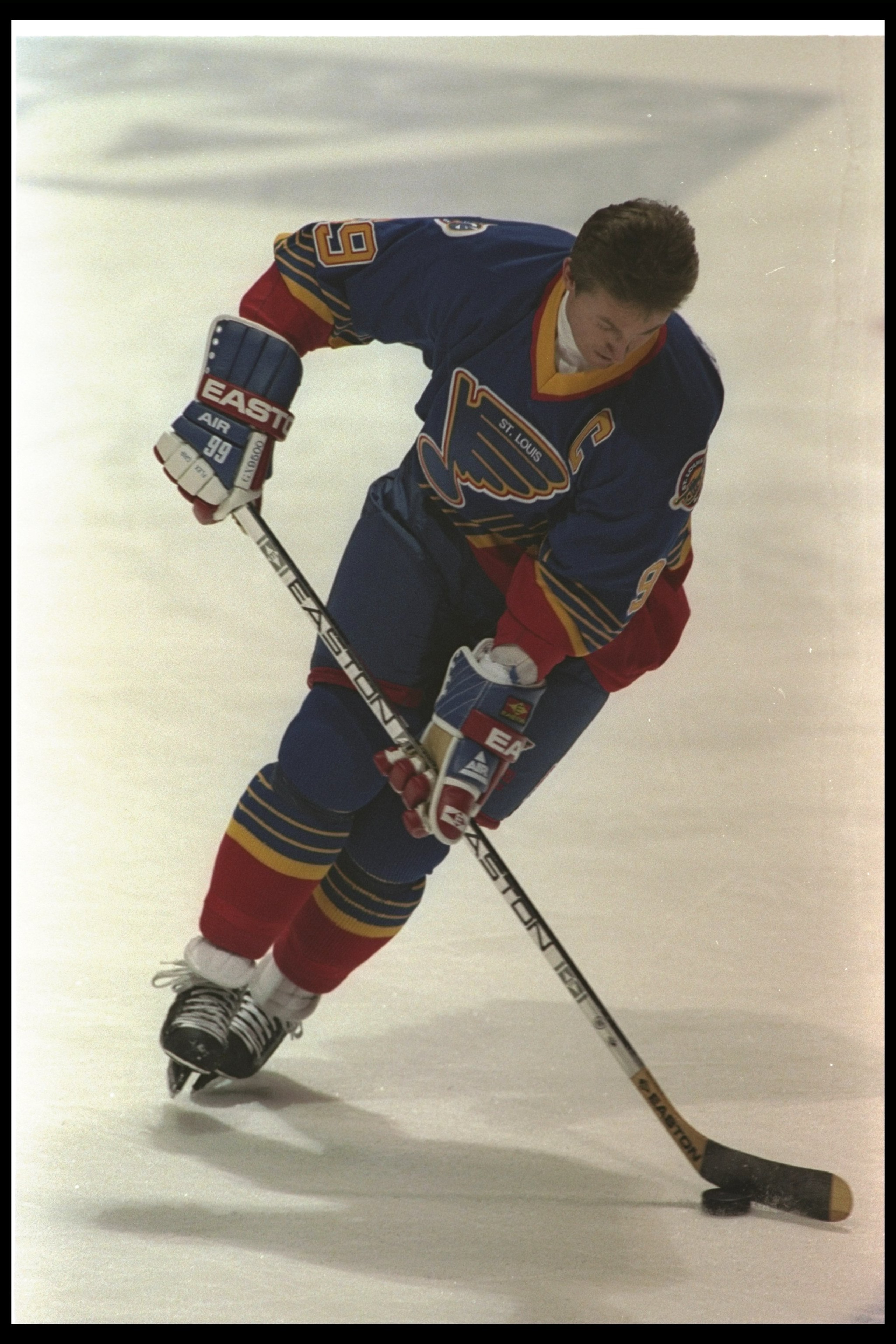 29 Feb 1996:  Center Wayne Gretzky of the St. Louis Blues moves the puck during a game against the Vancouver Canucks at General Motors Place in Vancouver, British Columbia.  The game was a tie, 2-2. Mandatory Credit: Glenn Cratty  /Allsport