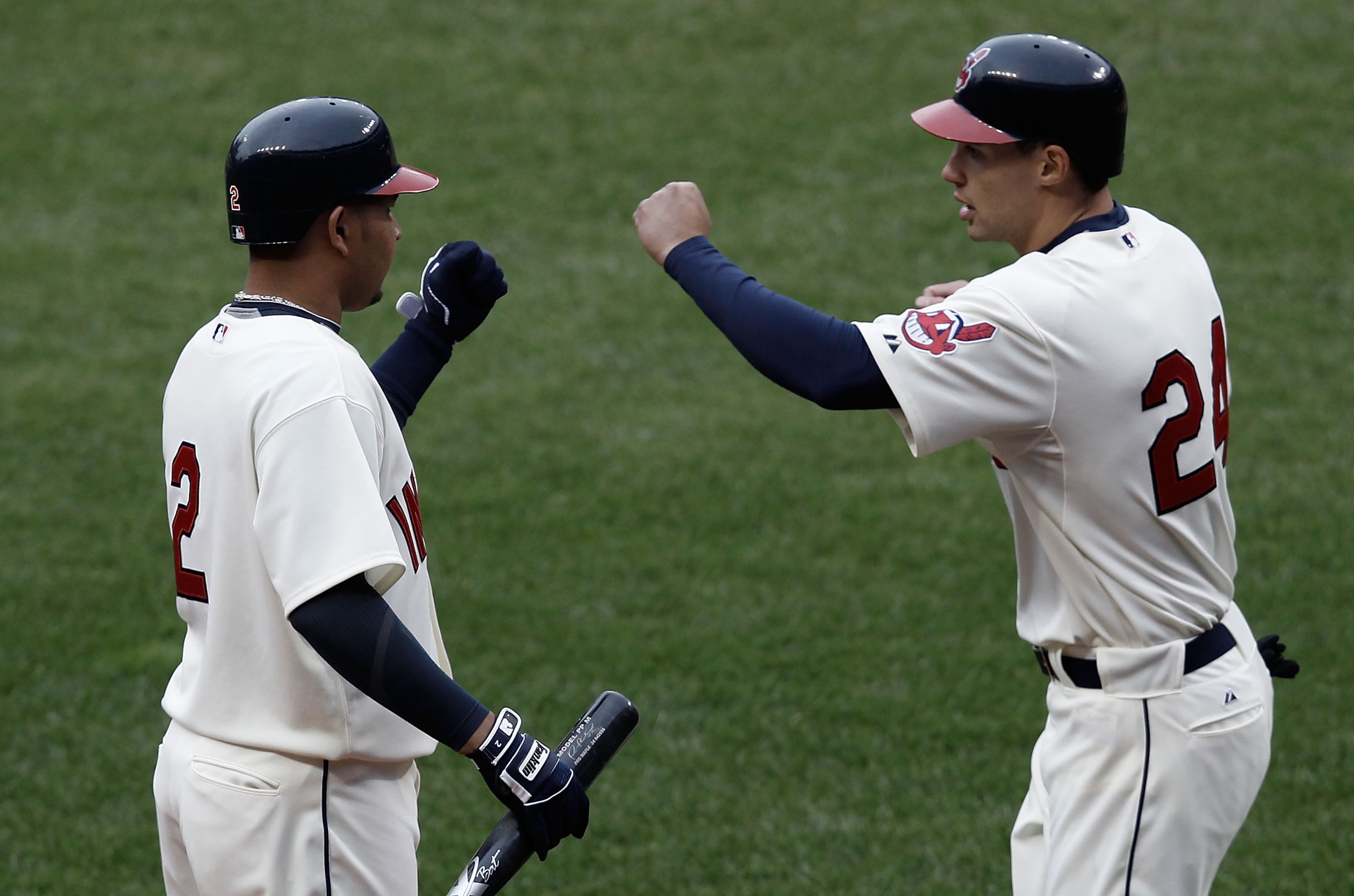 CLEVELAND, OH- APRIL 17: Grady Sizemore #24 is congratulated by teammate Jhonny Peralta #2 of the Cleveland Indians after scoring in the 8th inning against the Chicago White Sox during the game on April 17, 2010 at Progressive Field in Cleveland, Ohio. ( CLEVELAND, OH- APRIL 17: Grady Sizemore #24 is congratulated by teammate Jhonny Peralta #2 of the Cleveland Indians after scoring in the 8th inning against the Chicago White Sox during the game on April 17, 2010 at Progressive Field in Cleveland, Ohio. (