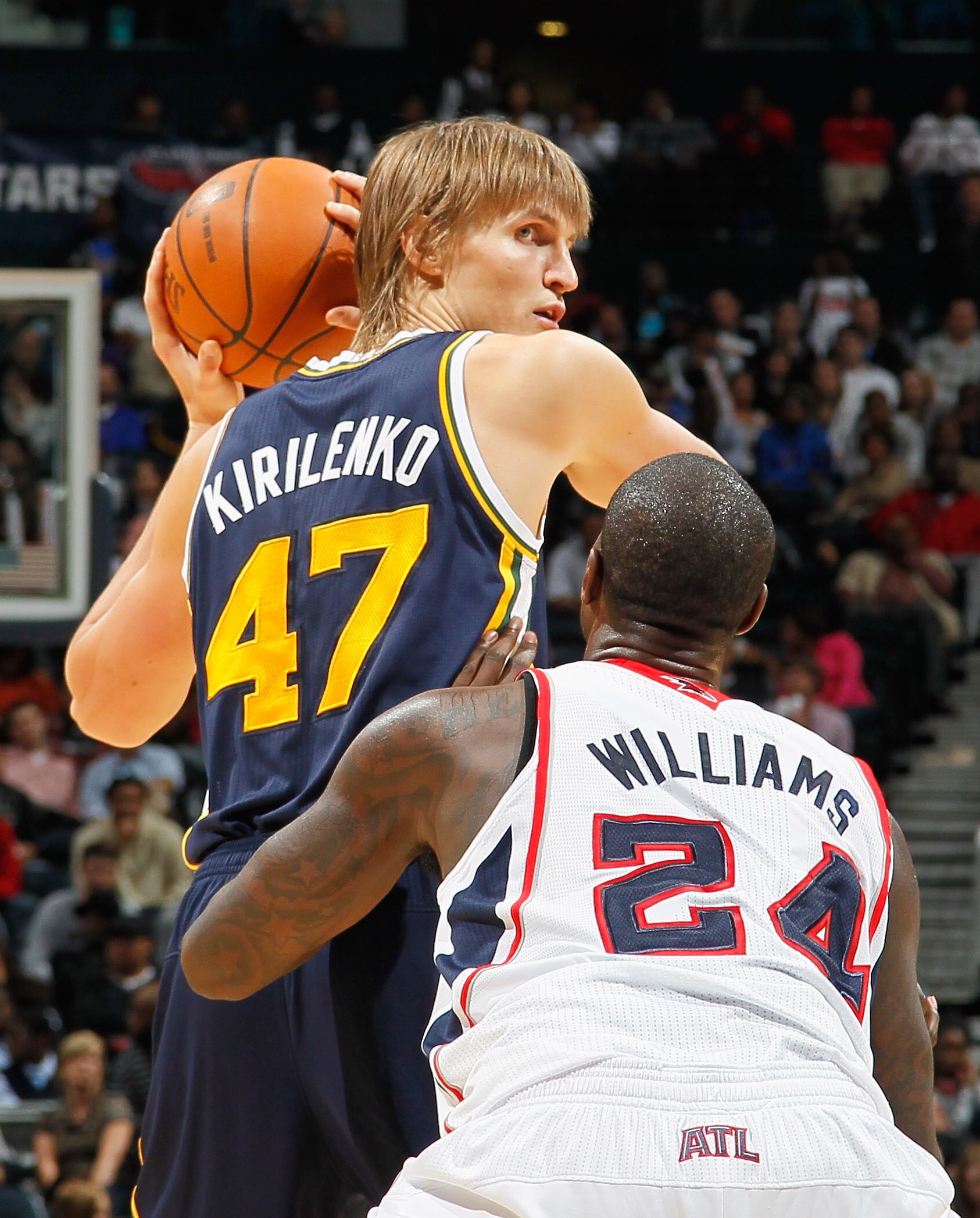 ATLANTA - NOVEMBER 12:  Andrei Kirilenko #47 of the Utah Jazz against Marvin Williams #24 of the Atlanta Hawks at Philips Arena on November 12, 2010 in Atlanta, Georgia.  NOTE TO USER: User expressly acknowledges and agrees that, by downloading and/or usi